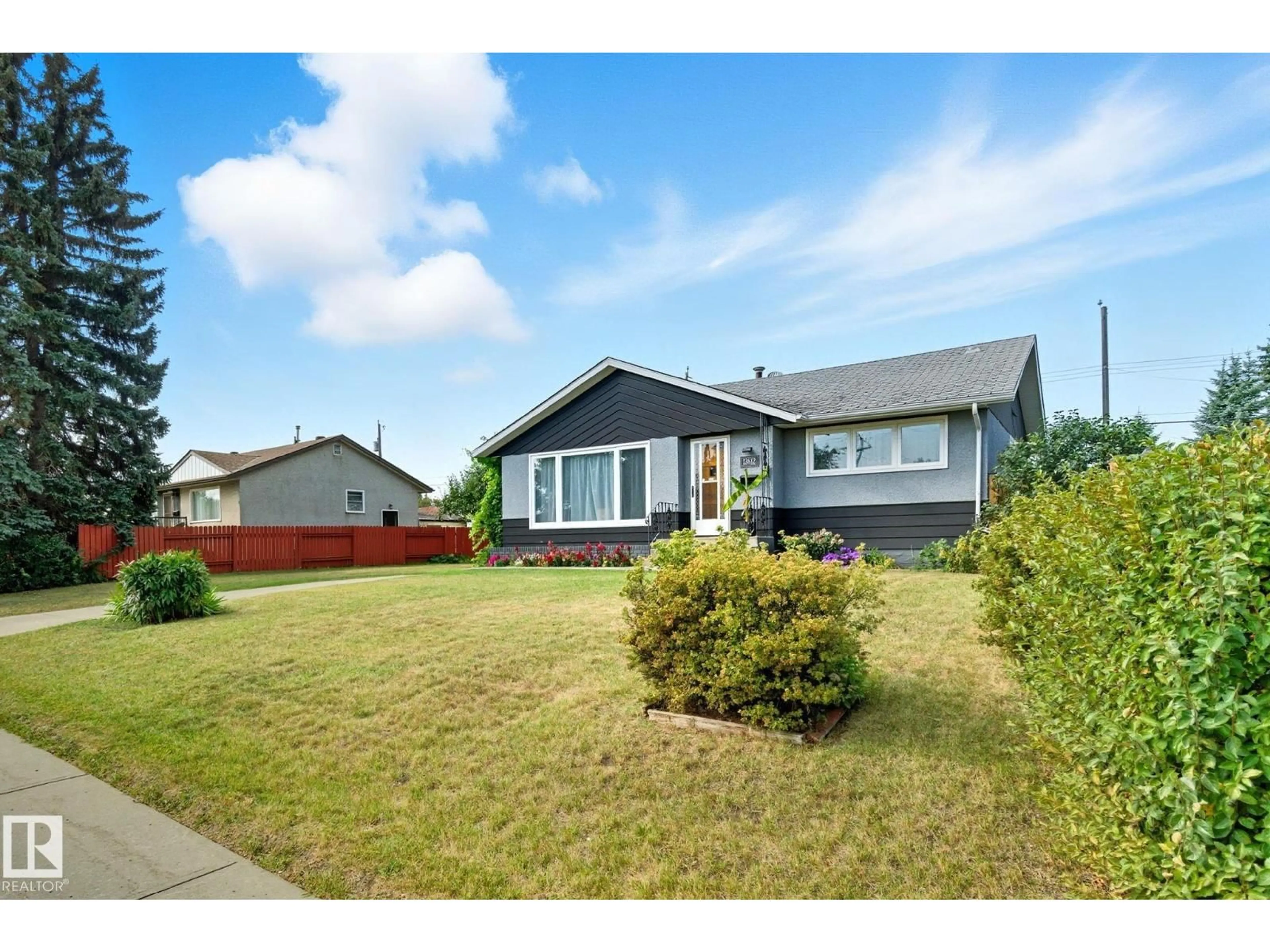 Home with vinyl exterior material, street for NW - 13612 135 ST, Edmonton Alberta T5L1Z5