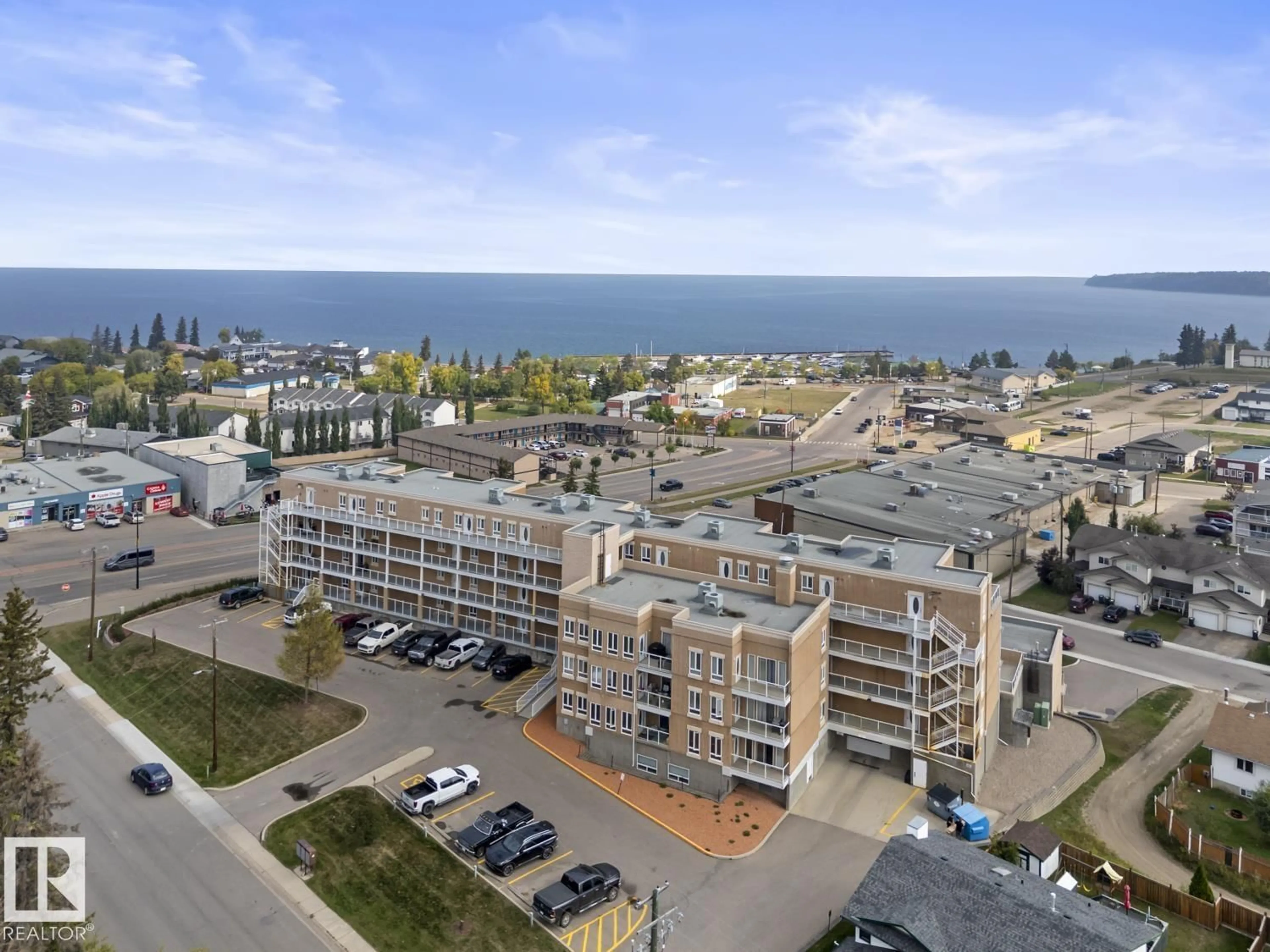 A pic from outside/outdoor area/front of a property/back of a property/a pic from drone, unknown for 205 802 12 ST, Cold Lake Alberta T9M0A7