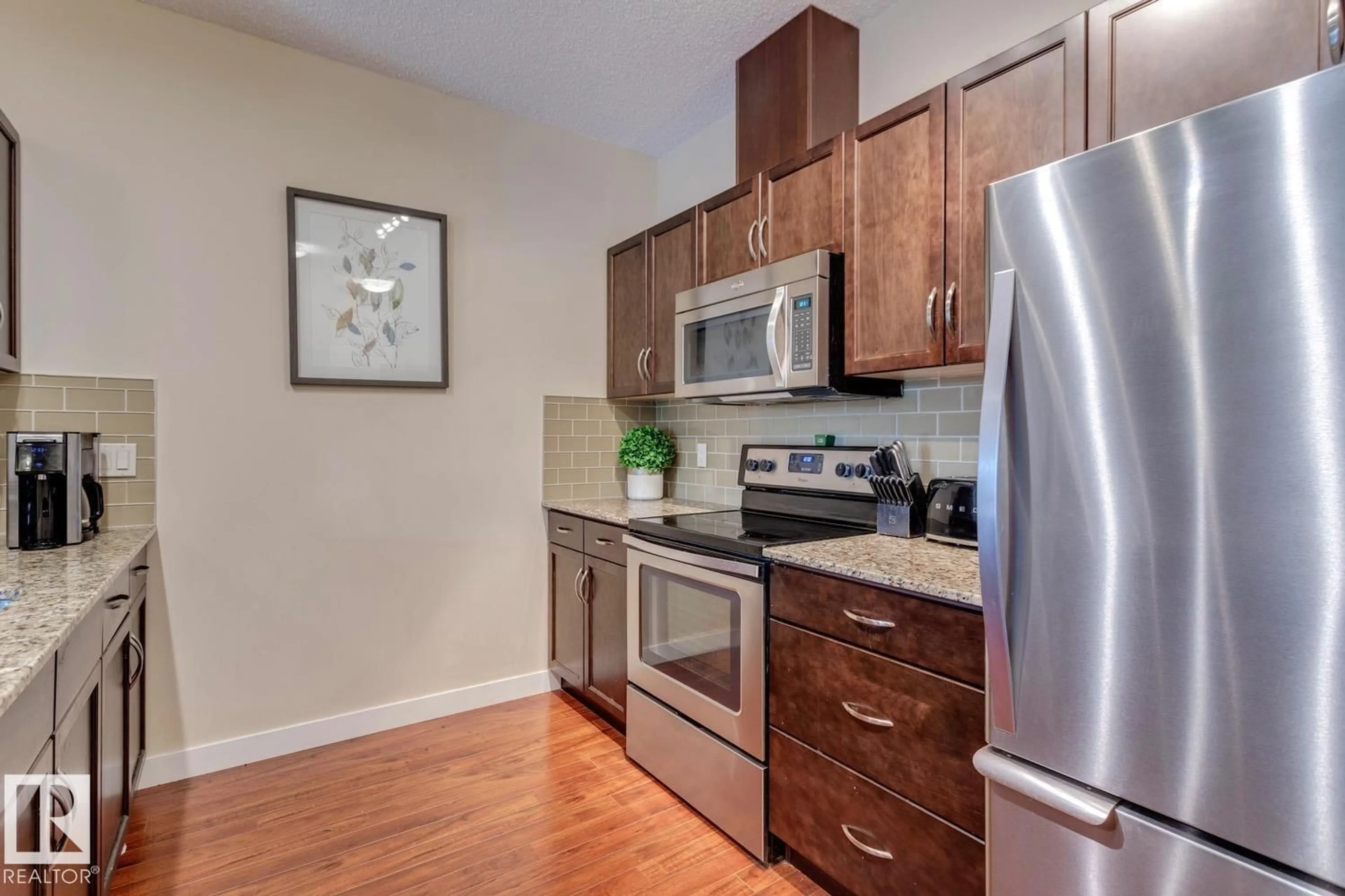 Standard kitchen, wood/laminate floor for #426 - 2045 GRANTHAM CT, Edmonton Alberta T5T3X6