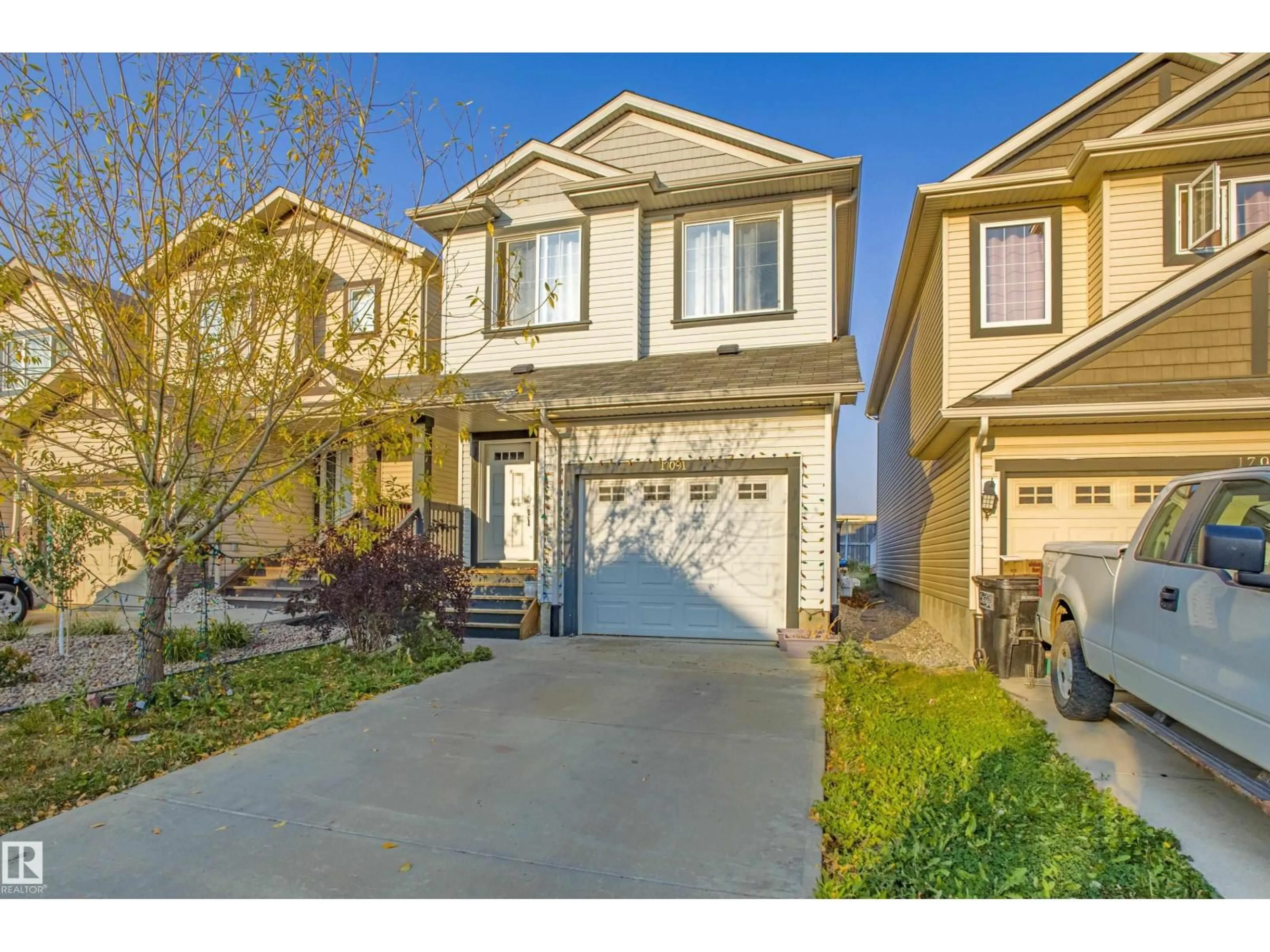 Home with vinyl exterior material, street for 17091 38 ST., Edmonton Alberta T5Y6M1