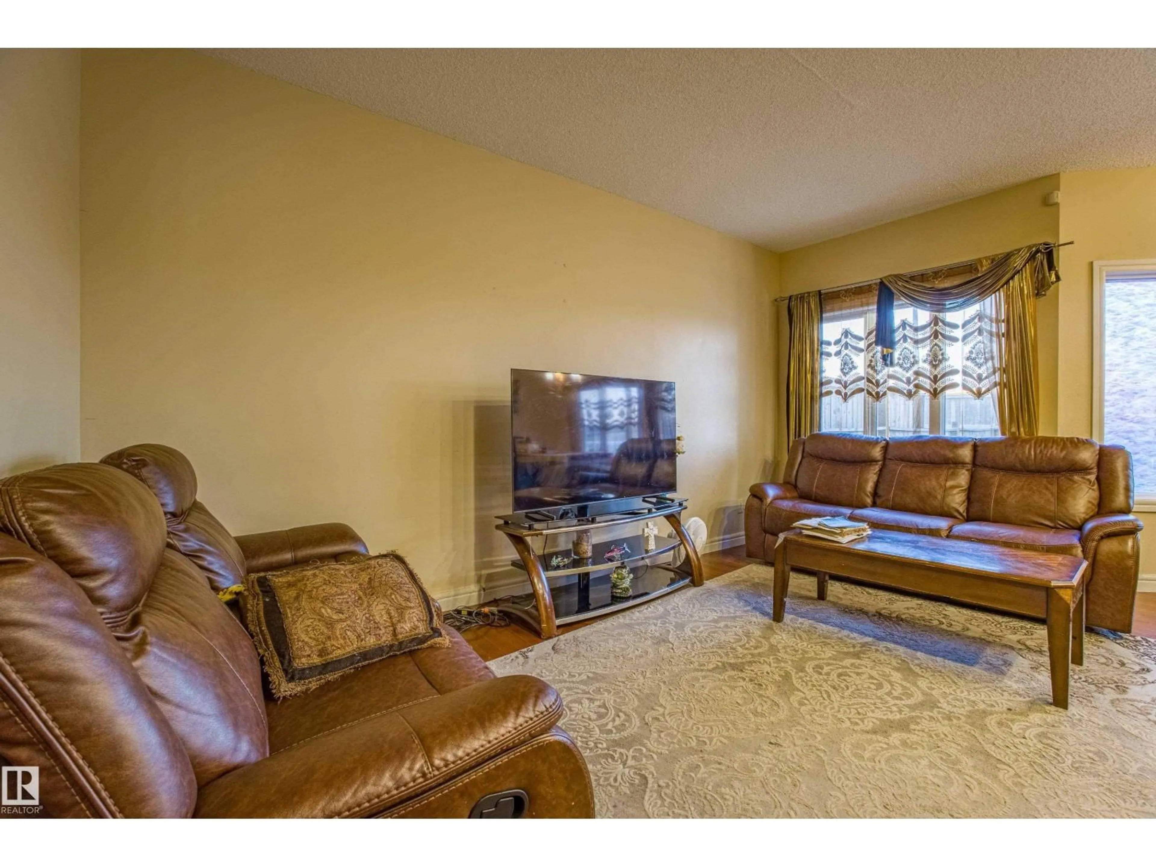 Living room with furniture, unknown for 17091 38 ST., Edmonton Alberta T5Y6M1
