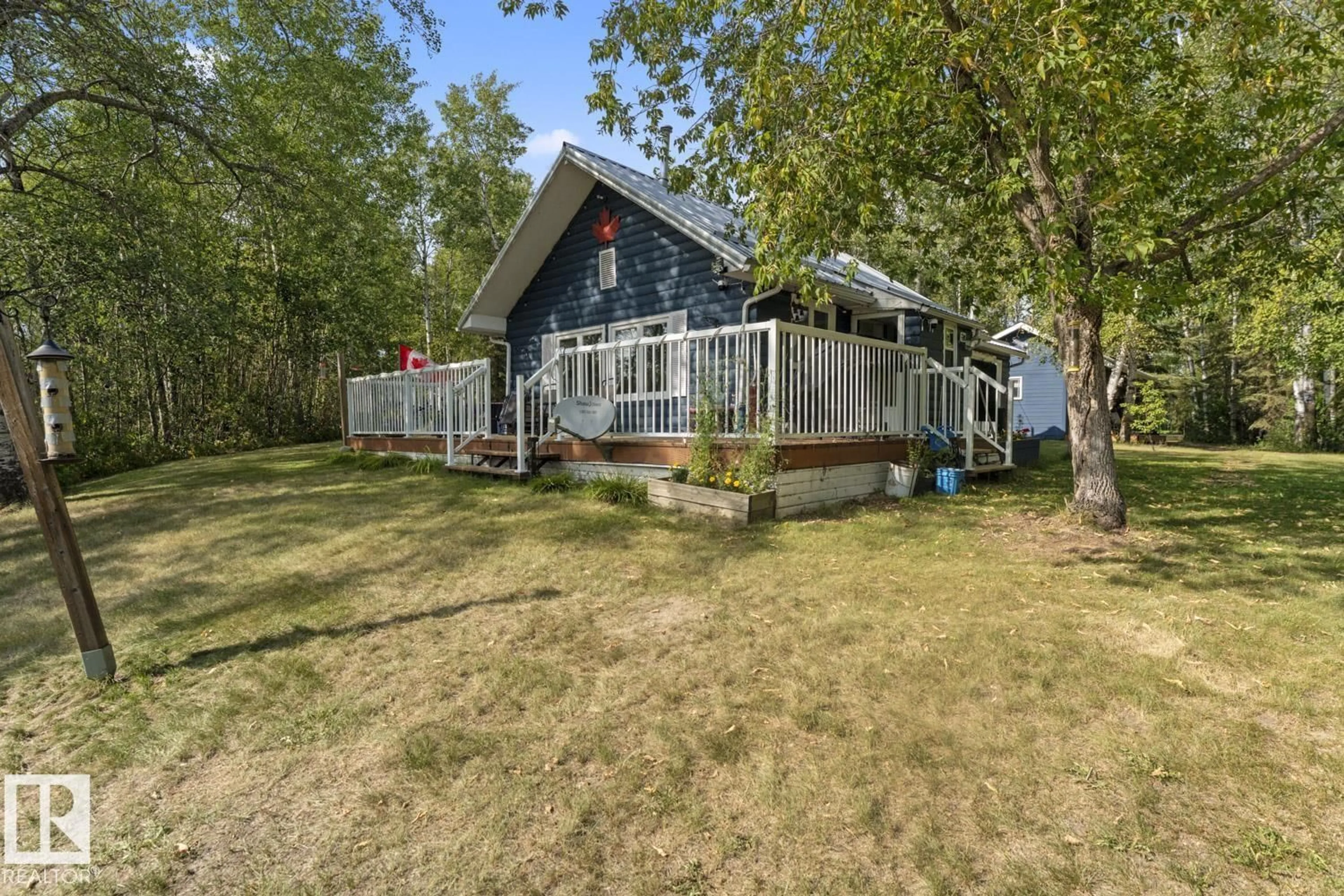 A pic from outside/outdoor area/front of a property/back of a property/a pic from drone, water/lake/river/ocean view for 110 - 527 RNG RD, Rural St. Paul County Alberta T0A0C0