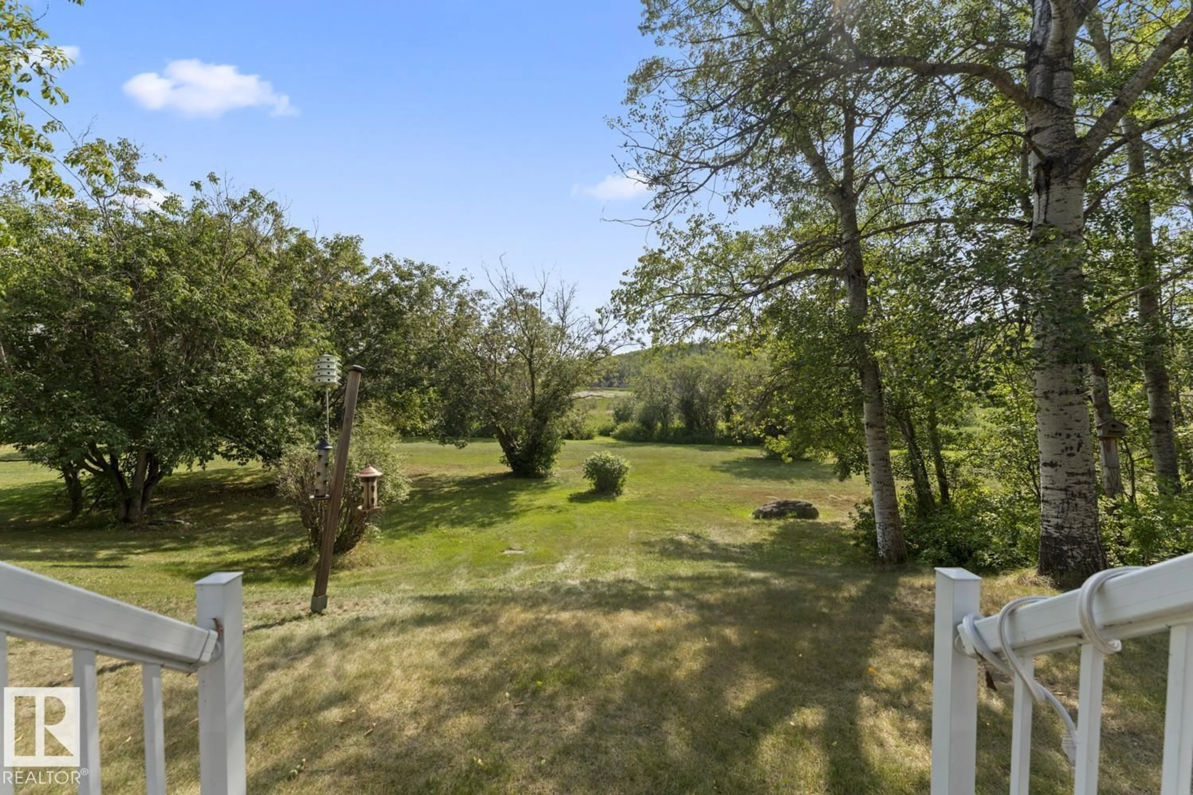 A pic from outside/outdoor area/front of a property/back of a property/a pic from drone, forest/trees view for 110 - 527 RNG RD, Rural St. Paul County Alberta T0A0C0