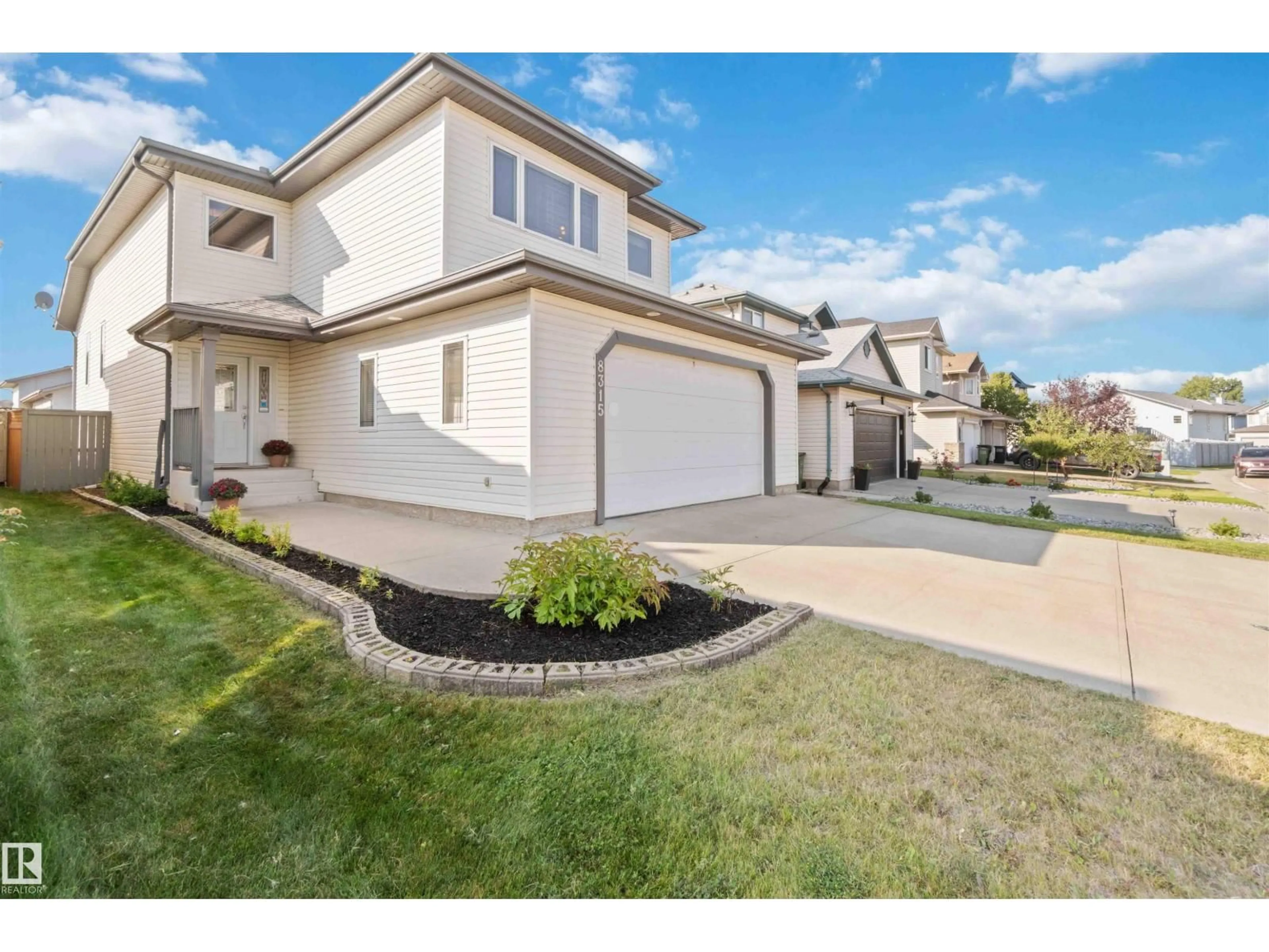 A pic from outside/outdoor area/front of a property/back of a property/a pic from drone, street for 8315 172 AVE NW, Edmonton Alberta T5Z3M1