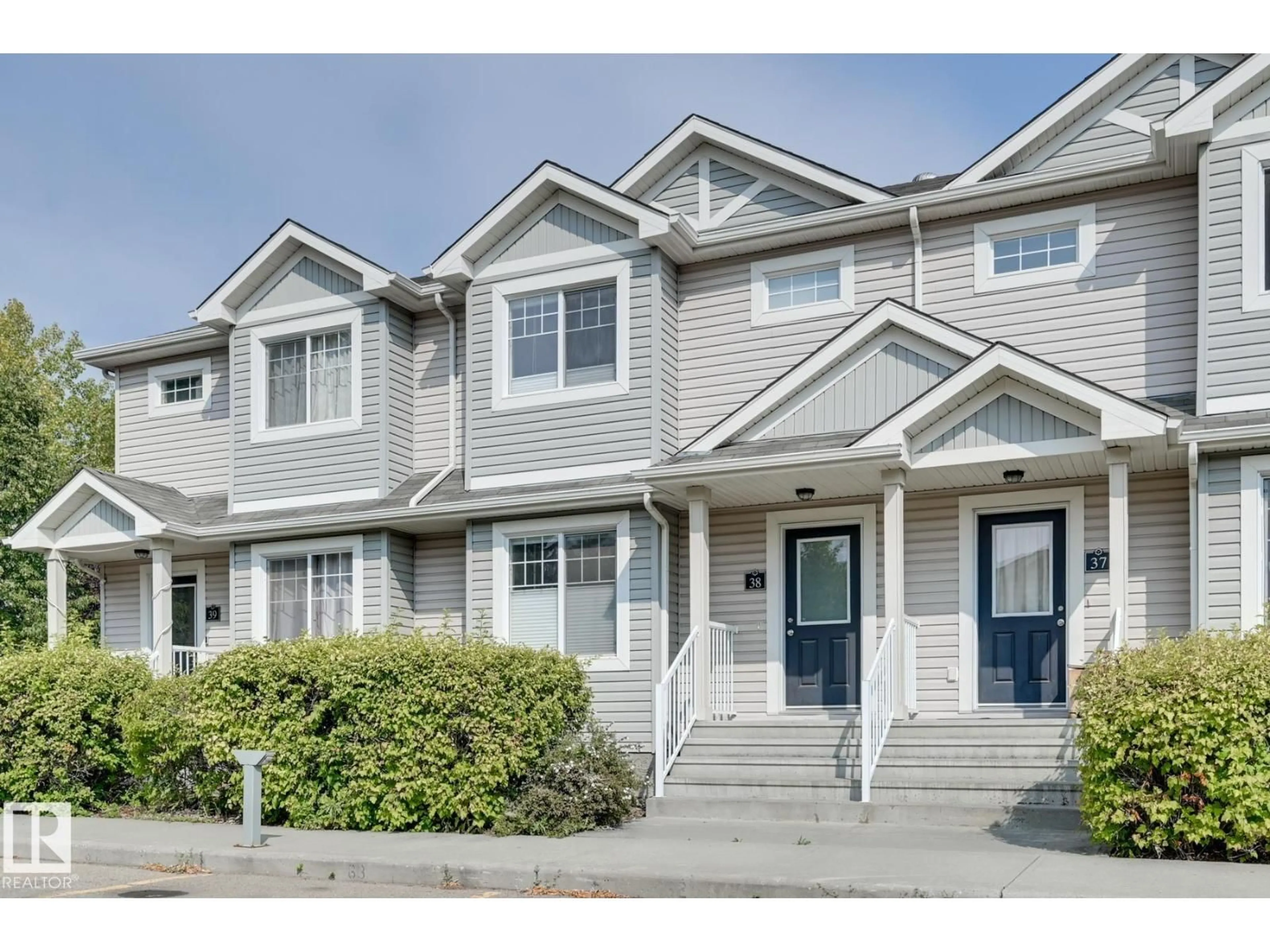 Home with vinyl exterior material, street for 38 - 6032 38 AV NW, Edmonton Alberta T6L0A4