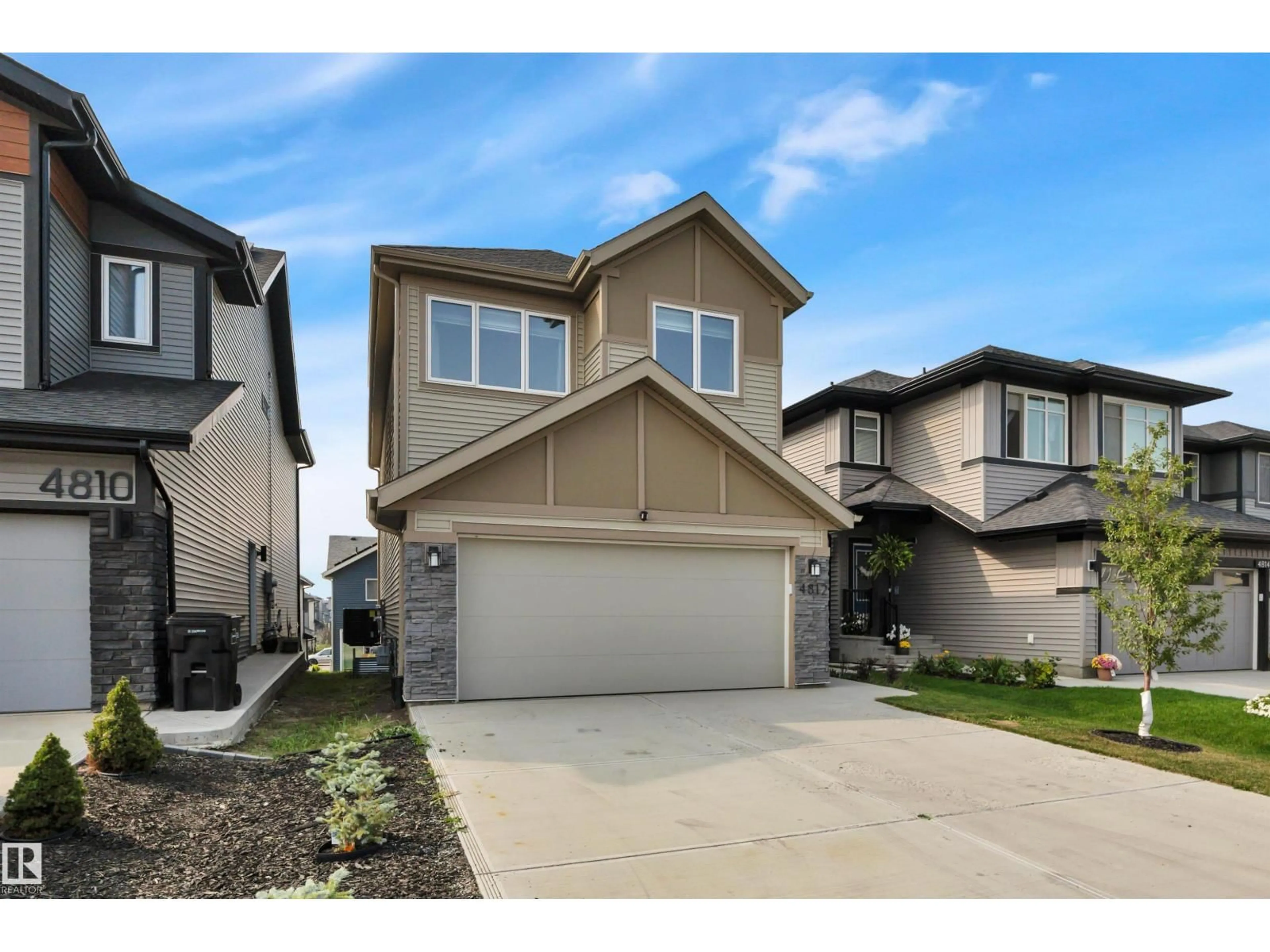 Home with vinyl exterior material, street for 4812 KINNEY RD, Edmonton Alberta T6W5G2