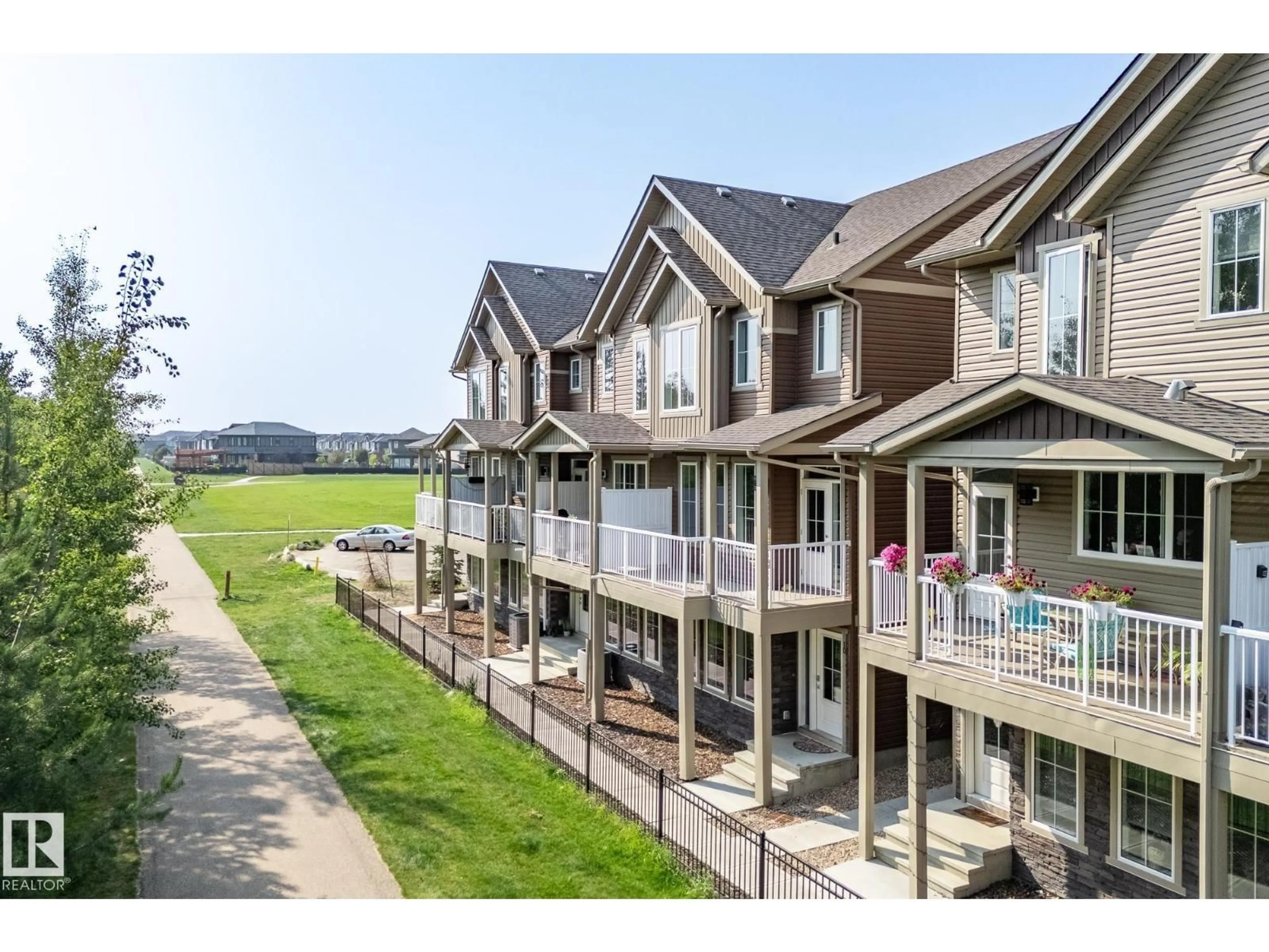 A pic from outside/outdoor area/front of a property/back of a property/a pic from drone, water/lake/river/ocean view for 9 - 1051 GRAYDON HILL BV, Edmonton Alberta T6W3C8
