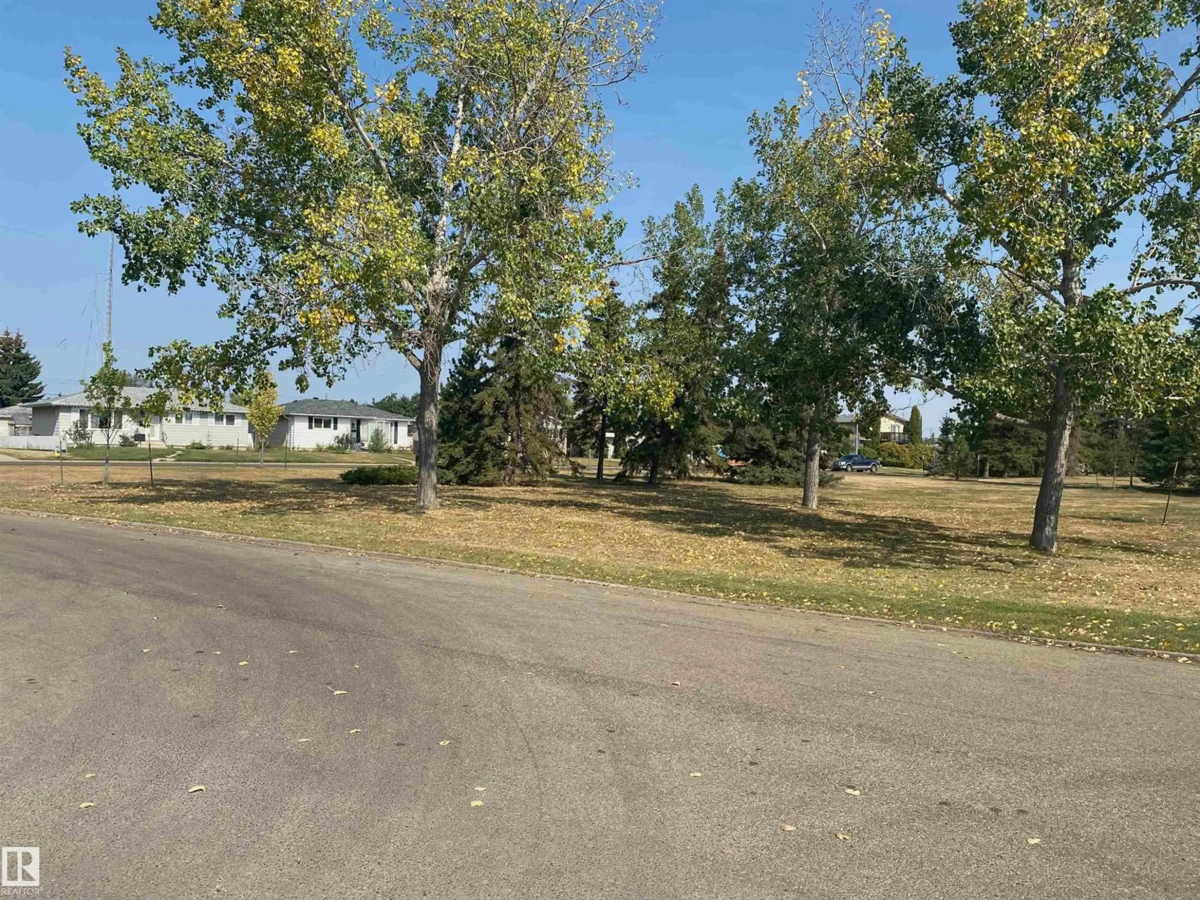 A pic from outside/outdoor area/front of a property/back of a property/a pic from drone, street for 7815 134B AV, Edmonton Alberta T5C3B9