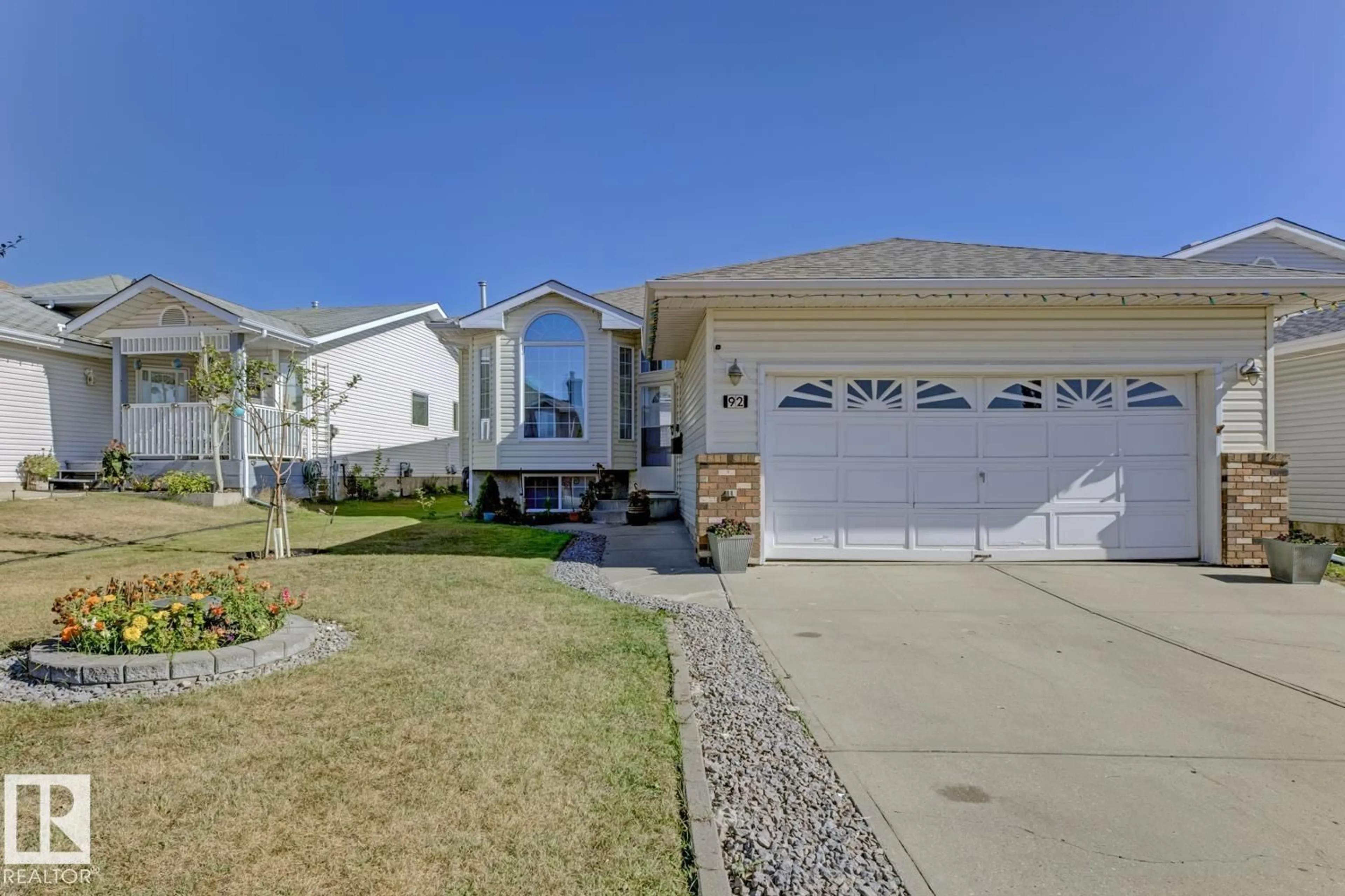 Home with vinyl exterior material, street for 92 JEFFERSON RD, Edmonton Alberta T6L6P8