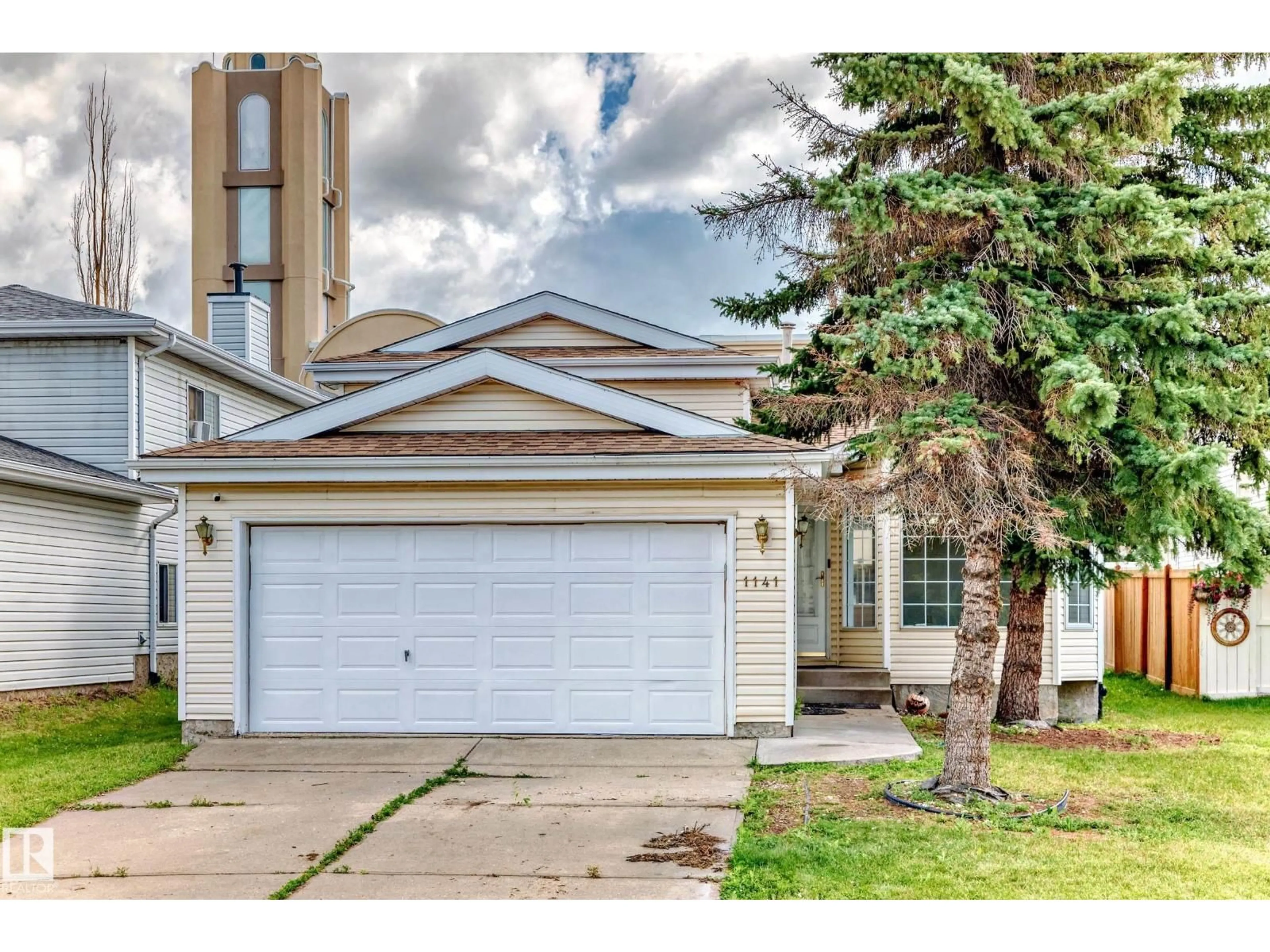 Home with vinyl exterior material, street for 1141 60 ST, Edmonton Alberta T6L6R4