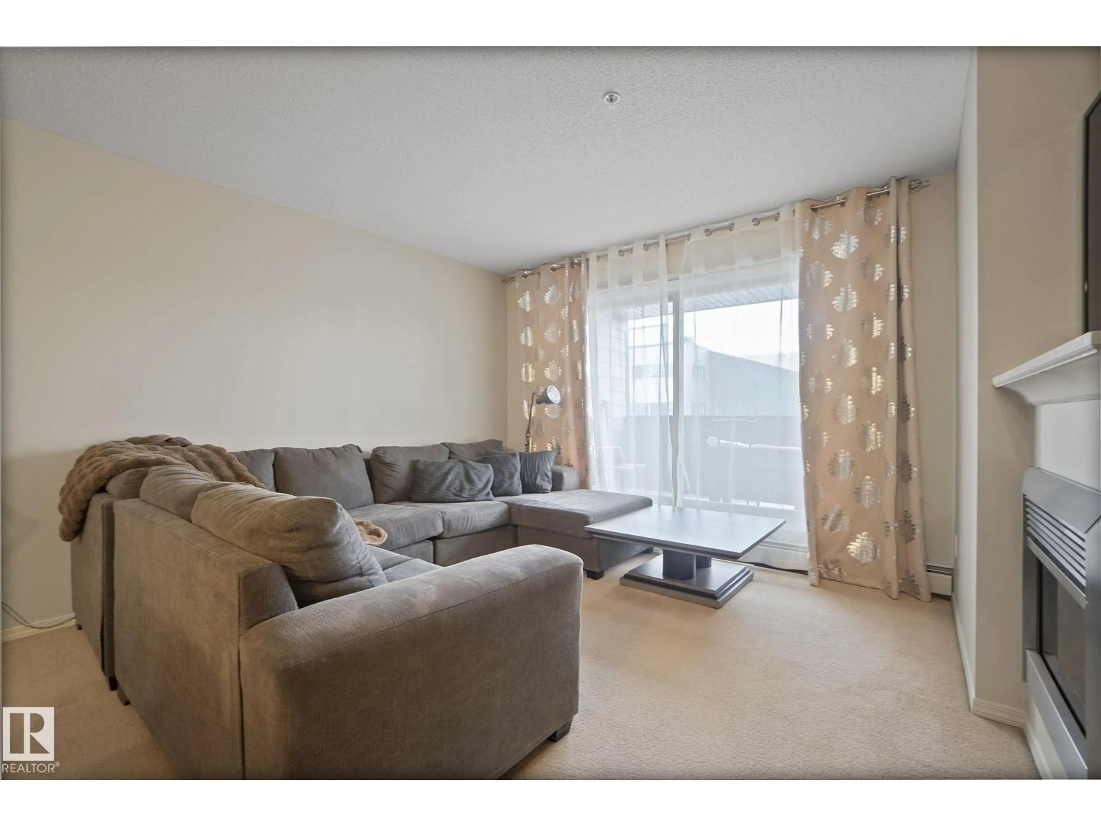 Living room with furniture, unknown for #312 - 17011 67 AV, Edmonton Alberta T5T6Y6