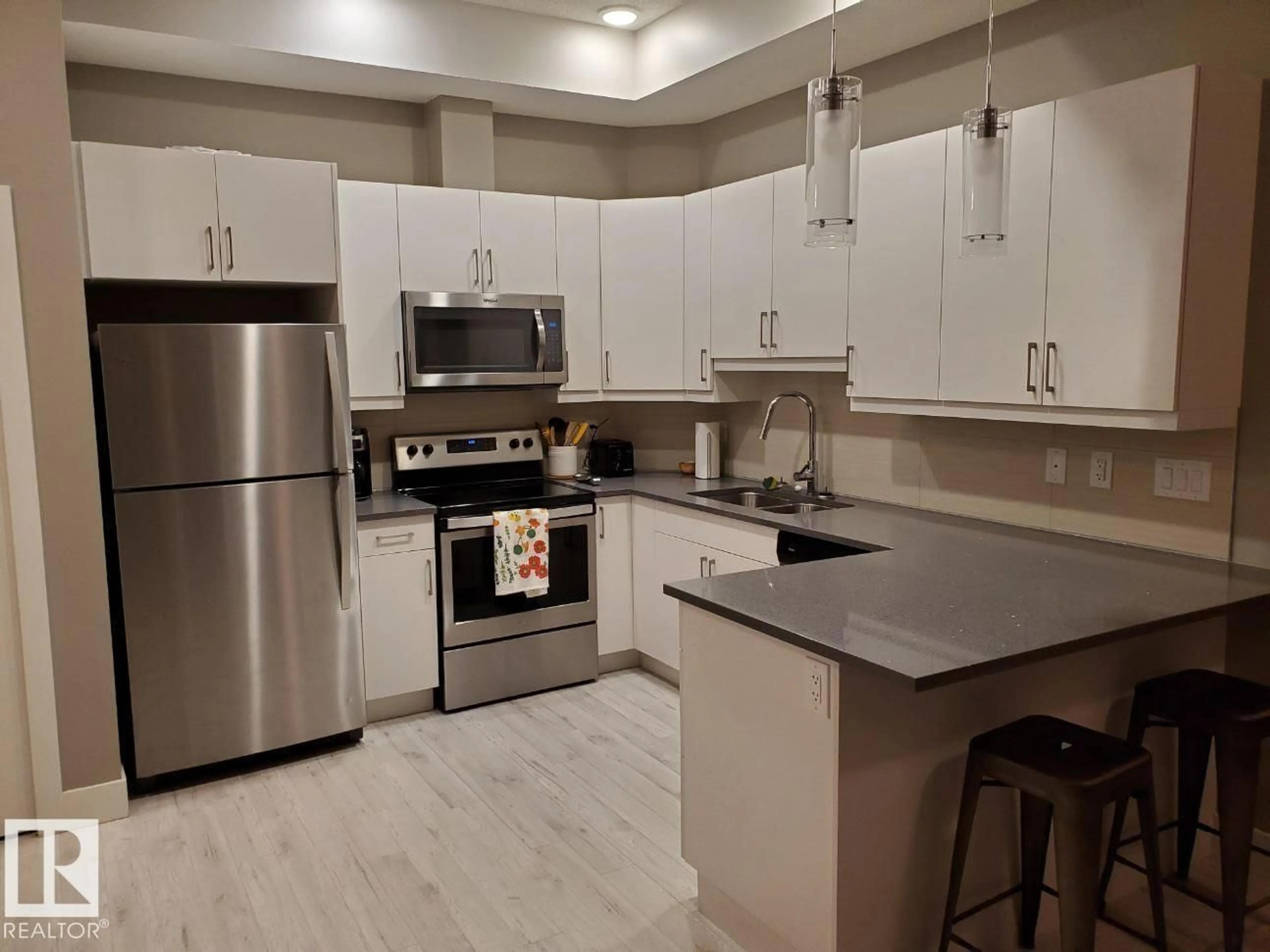 Open concept kitchen, unknown for 103 10006 83 AV, Edmonton Alberta T6E2C2