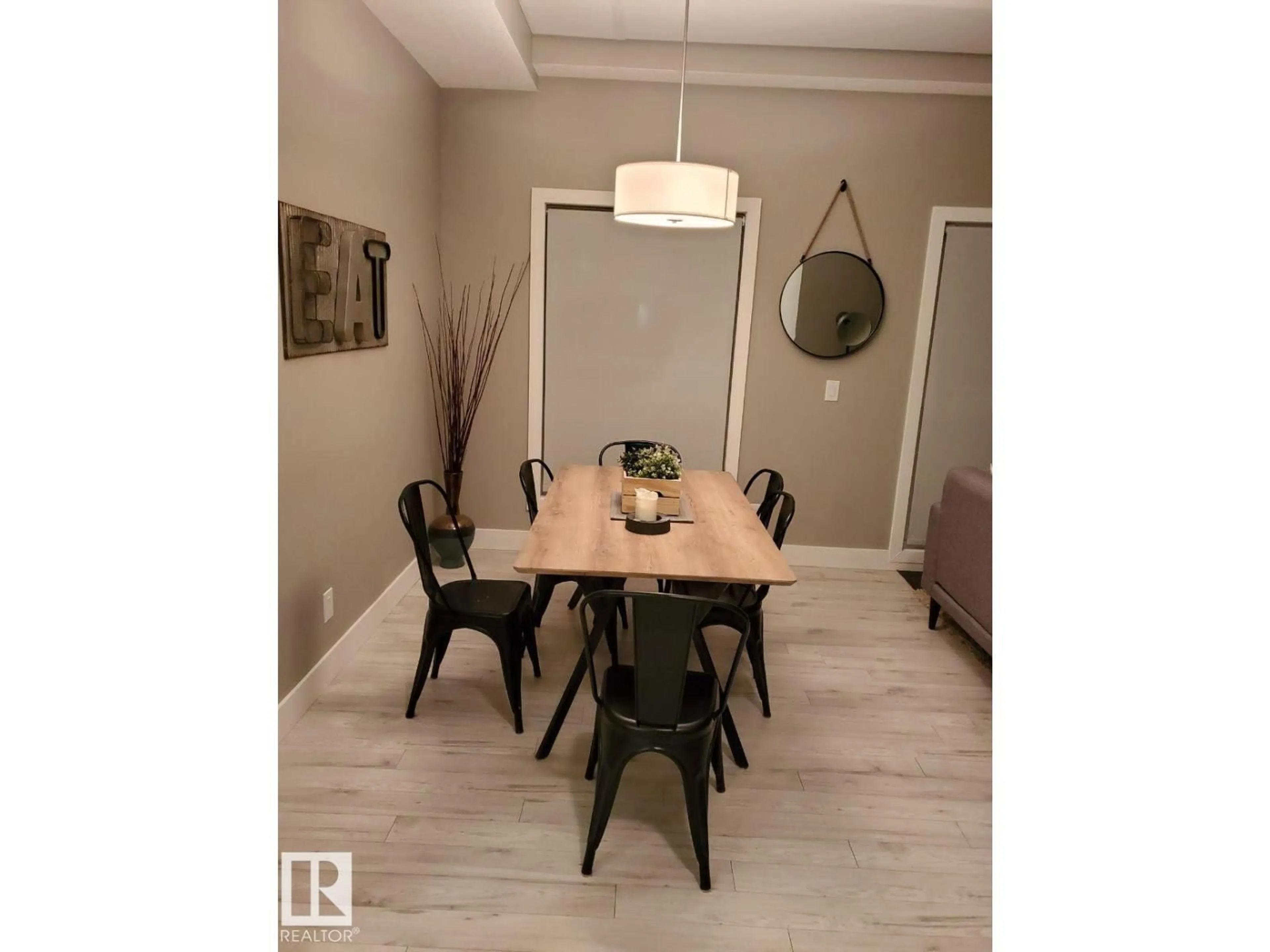 Dining room, wood/laminate floor for 103 10006 83 AV, Edmonton Alberta T6E2C2