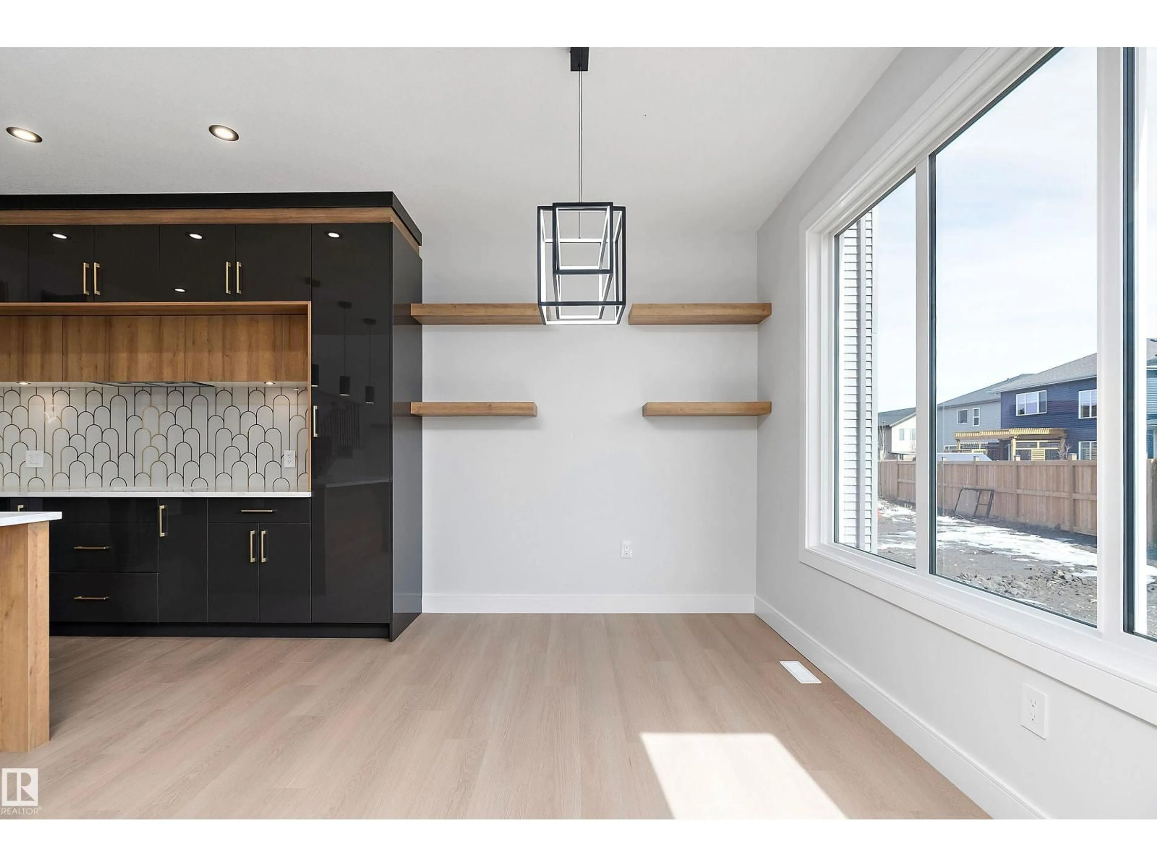 Open concept kitchen, wood/laminate floor for 31 HUMMINGBIRD, Fort Saskatchewan Alberta T8L0Y4
