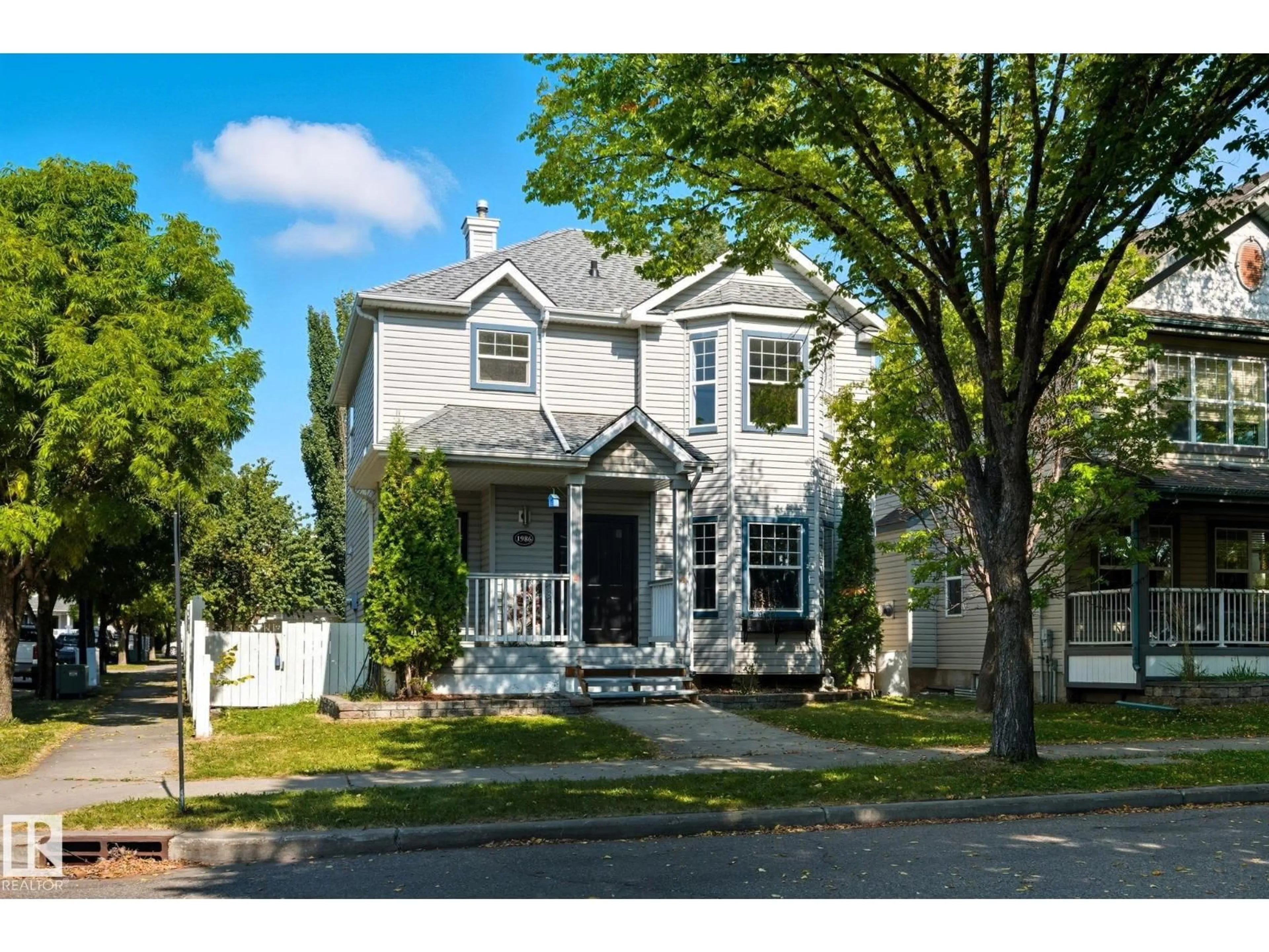 Home with vinyl exterior material, street for 1986 TOMLINSON GR, Edmonton Alberta T6R2S5