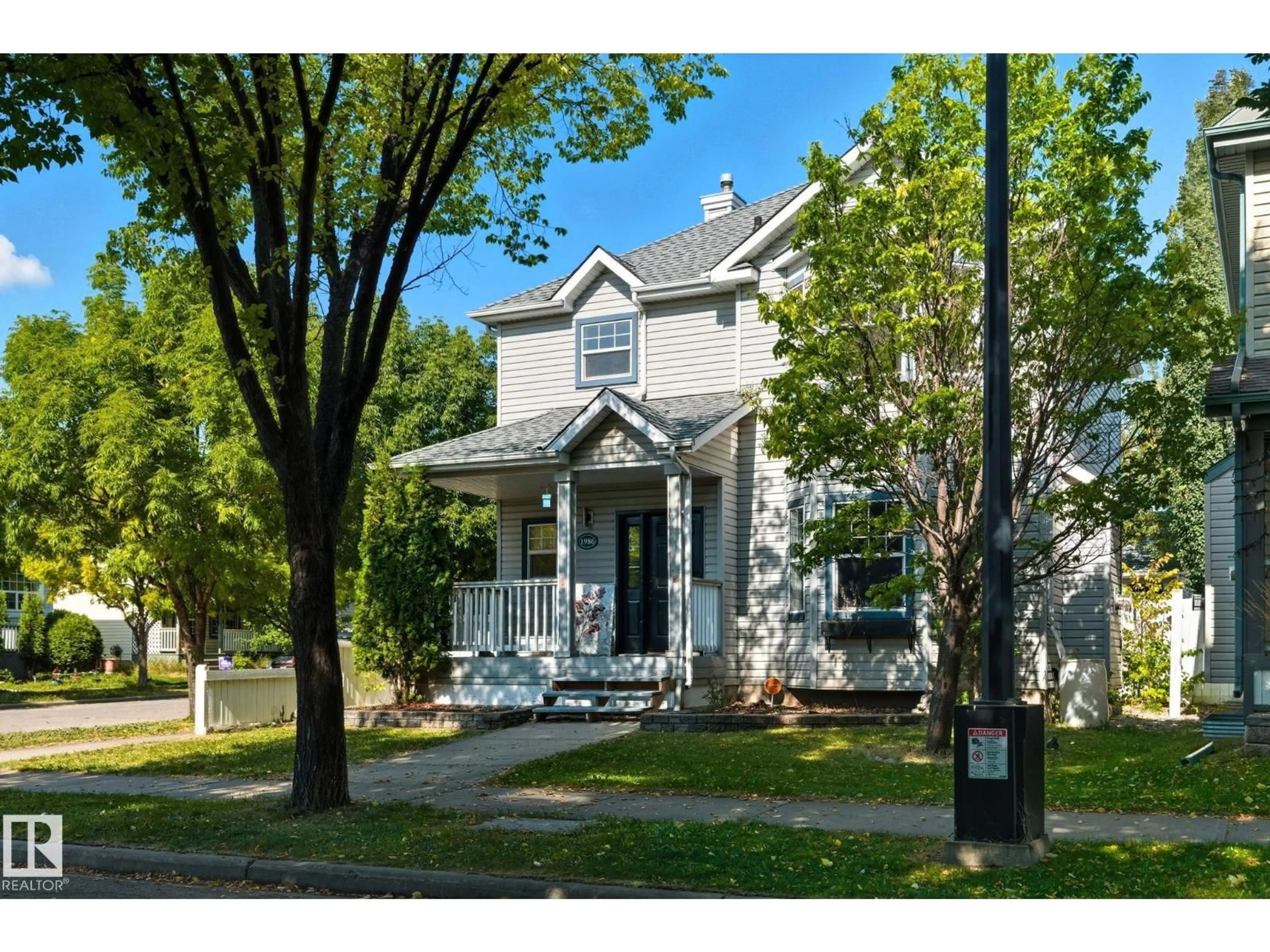 Home with vinyl exterior material, street for 1986 TOMLINSON GR, Edmonton Alberta T6R2S5