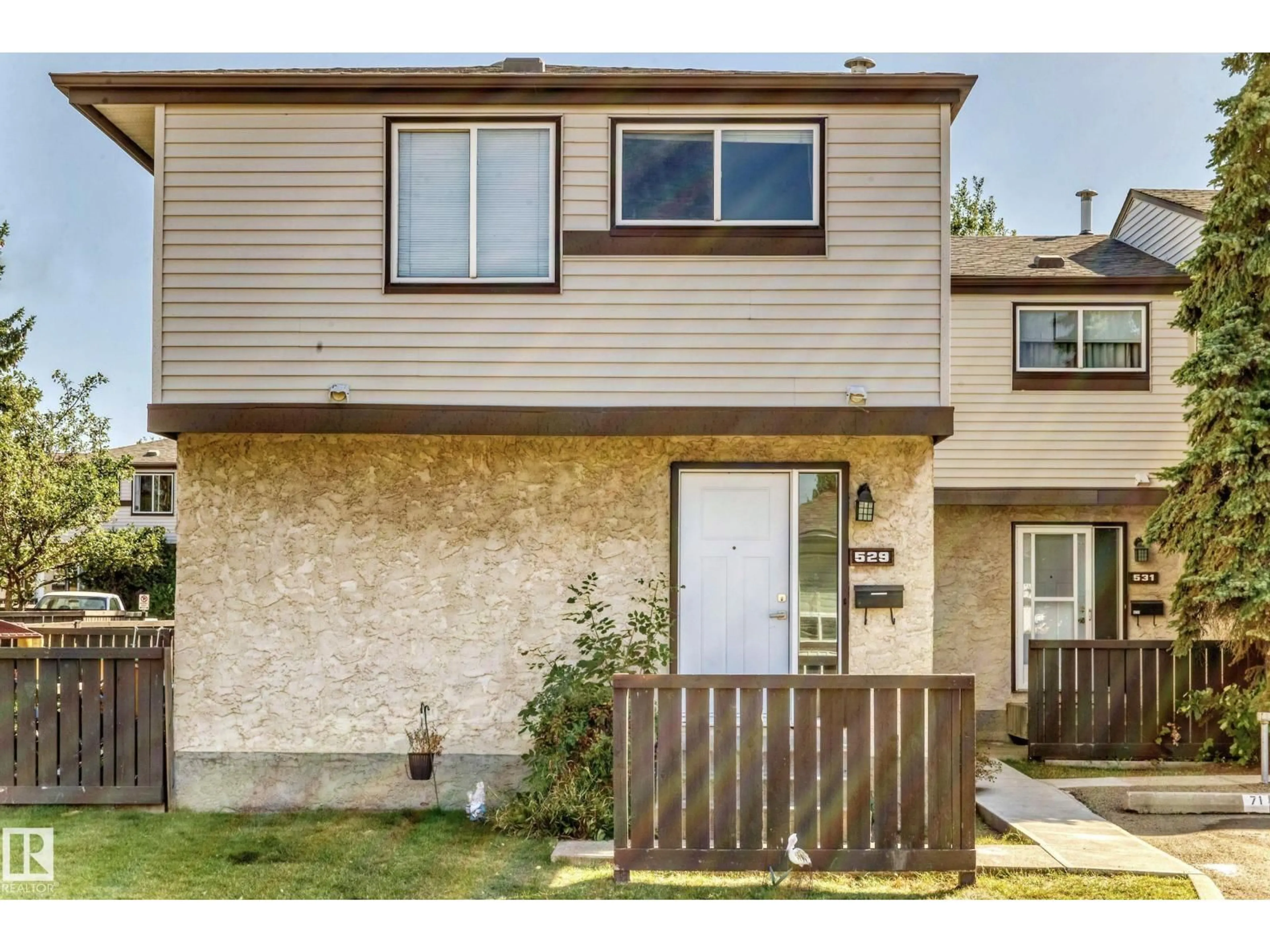 Home with vinyl exterior material, street for 529 KNOTTWOOD RD, Edmonton Alberta T6K2V6