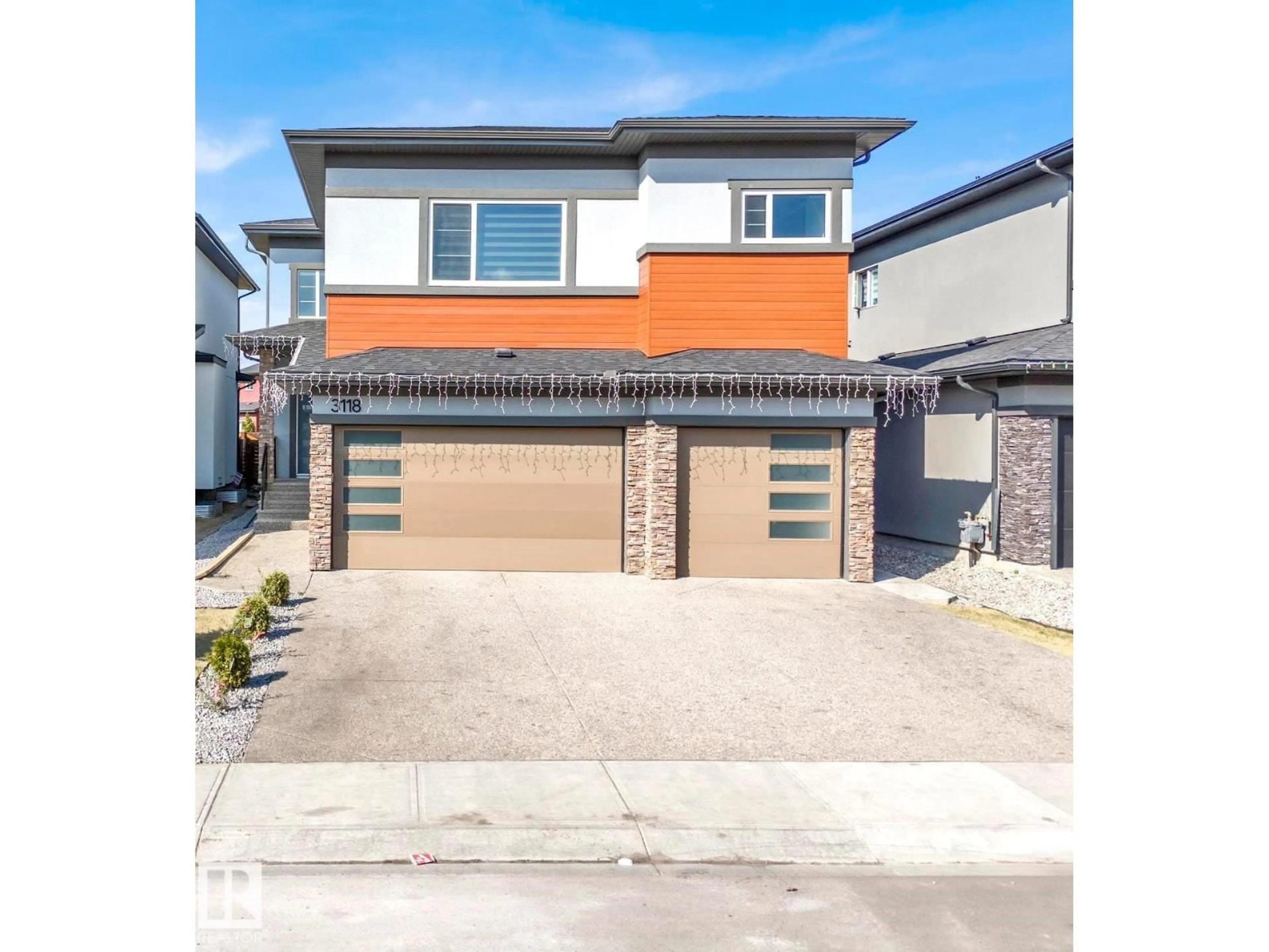 Home with brick exterior material, street for 3118 KOSTASH GR, Edmonton Alberta T6W4K3