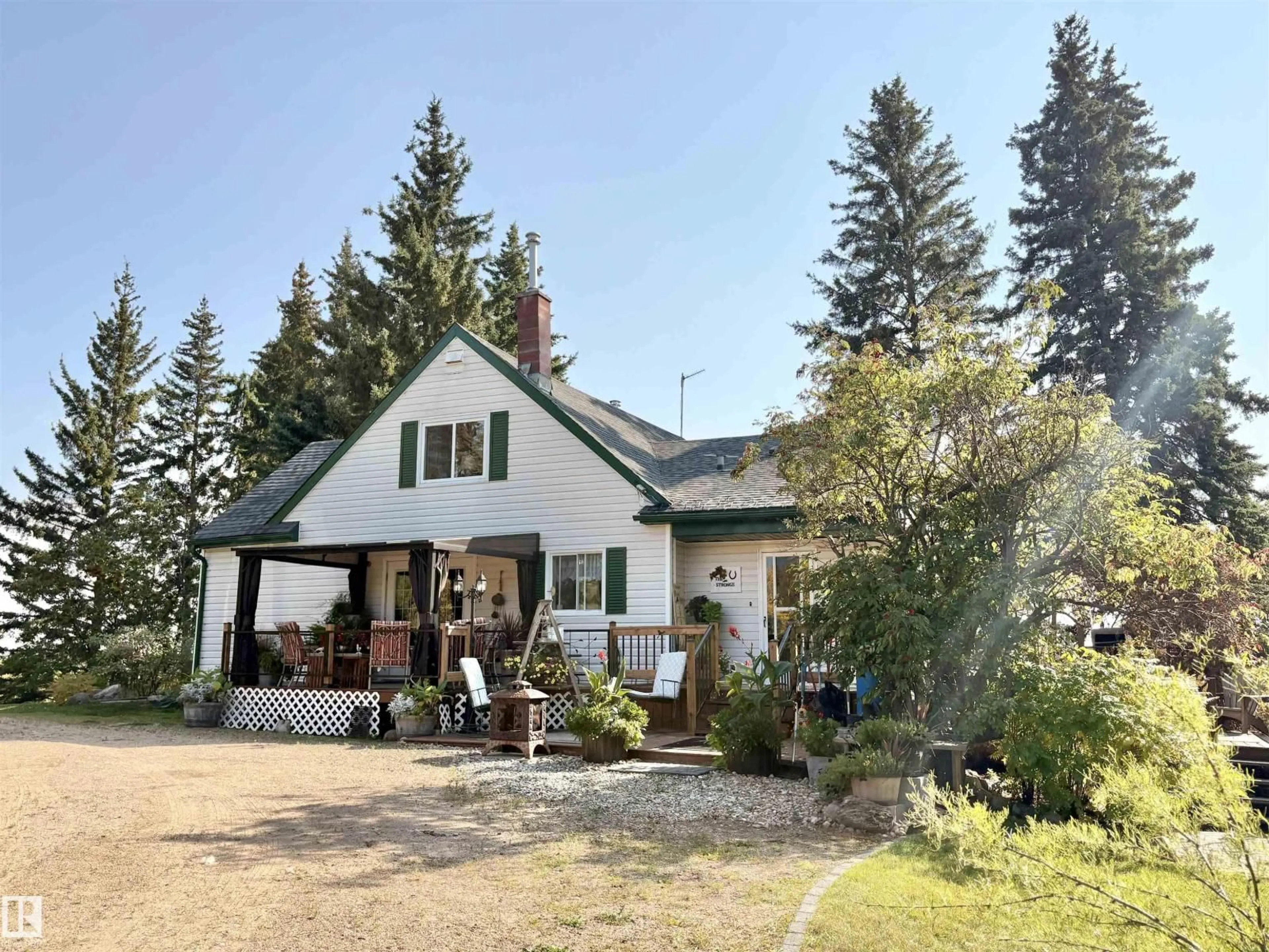 A pic from outside/outdoor area/front of a property/back of a property/a pic from drone, street for 63428 RGE RD 455, Rural Bonnyville M.D. Alberta T9N2J6