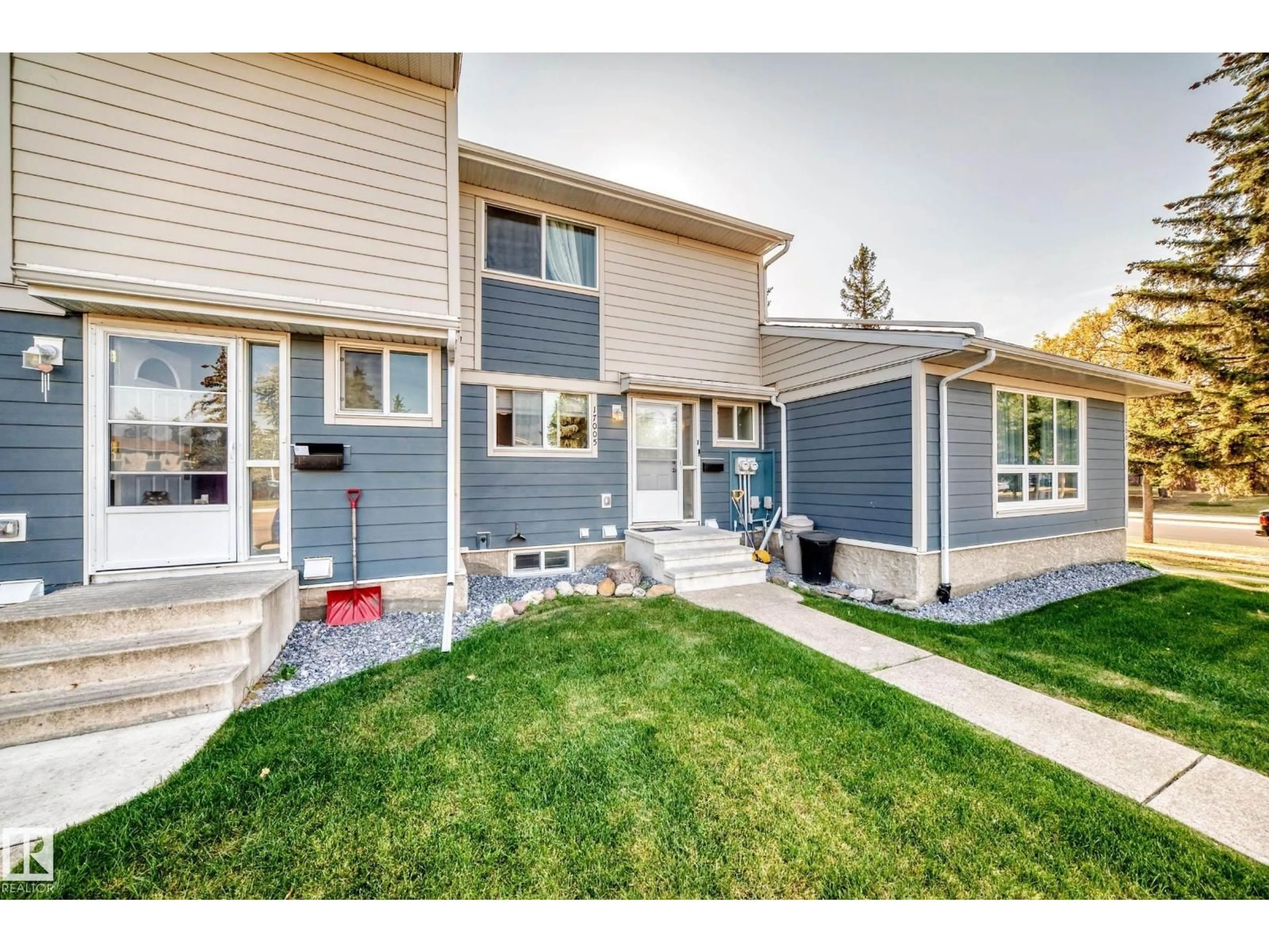 Home with vinyl exterior material, street for 17005 100 ST, Edmonton Alberta T5X4R8