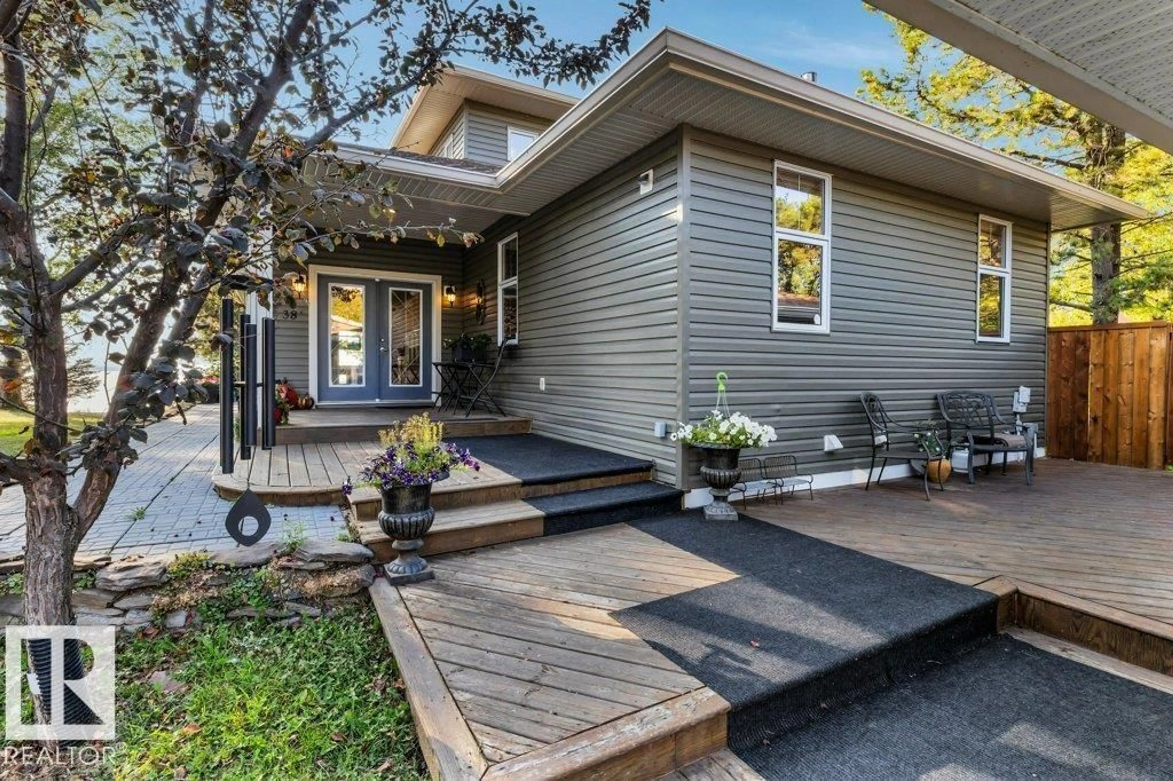 Home with vinyl exterior material, street for A38 BERNICE AVE, Rural Leduc County Alberta T0C2P0