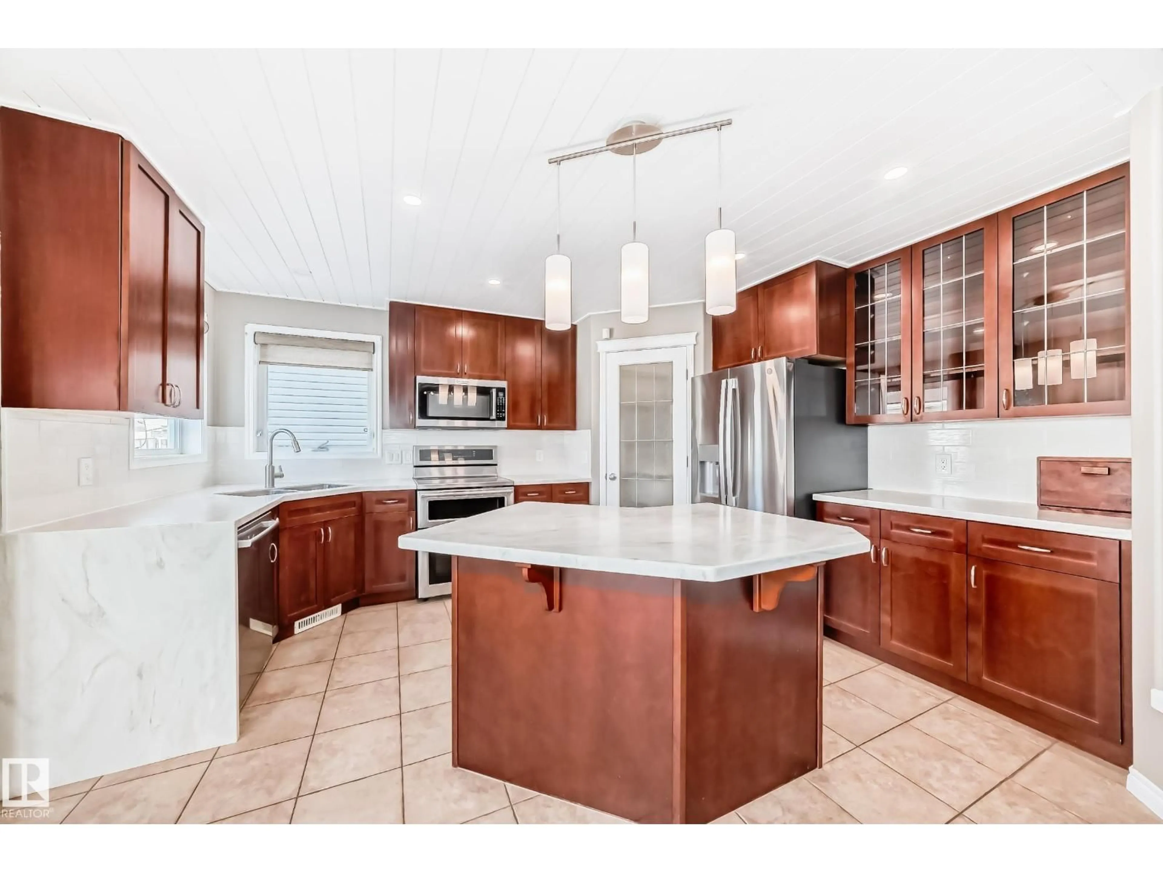 Open concept kitchen, ceramic/tile floor for NW - 6424 164 AV, Edmonton Alberta T5Y3J2