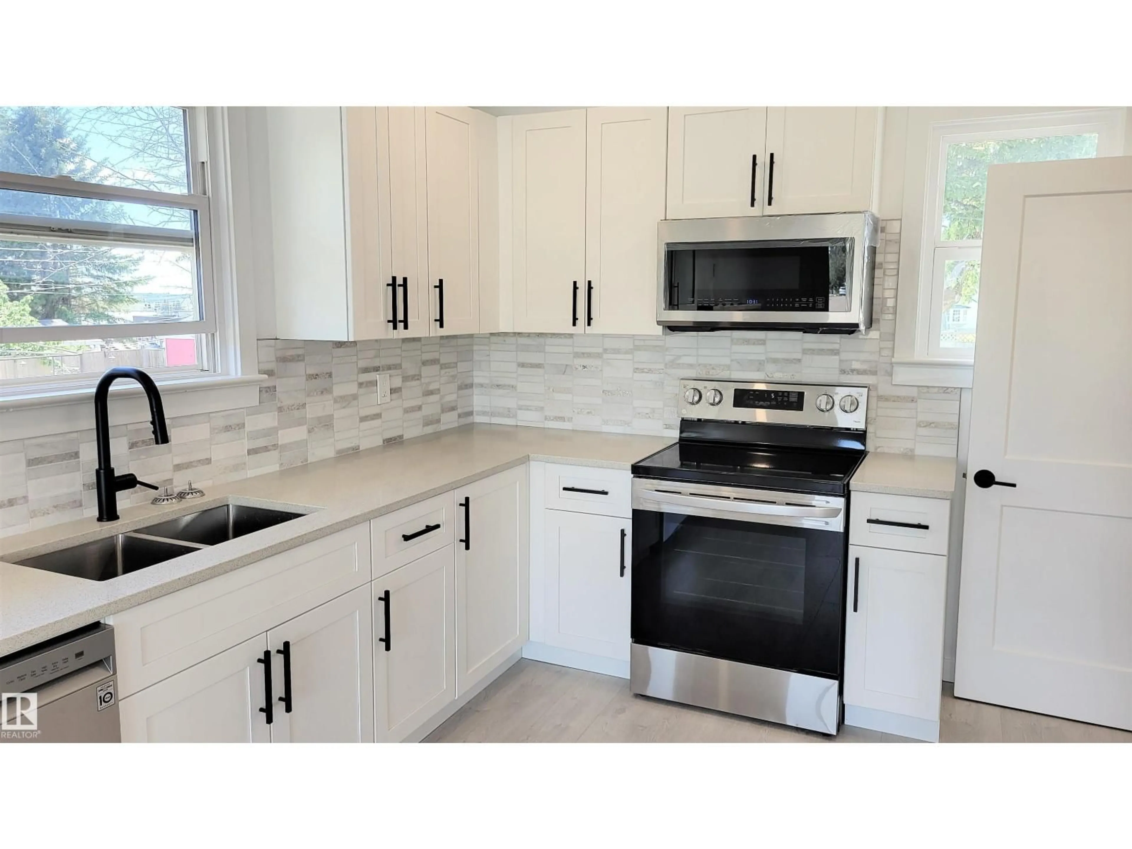 Open concept kitchen, ceramic/tile floor for 5020 49 ST, Two Hills Alberta T0B4K0