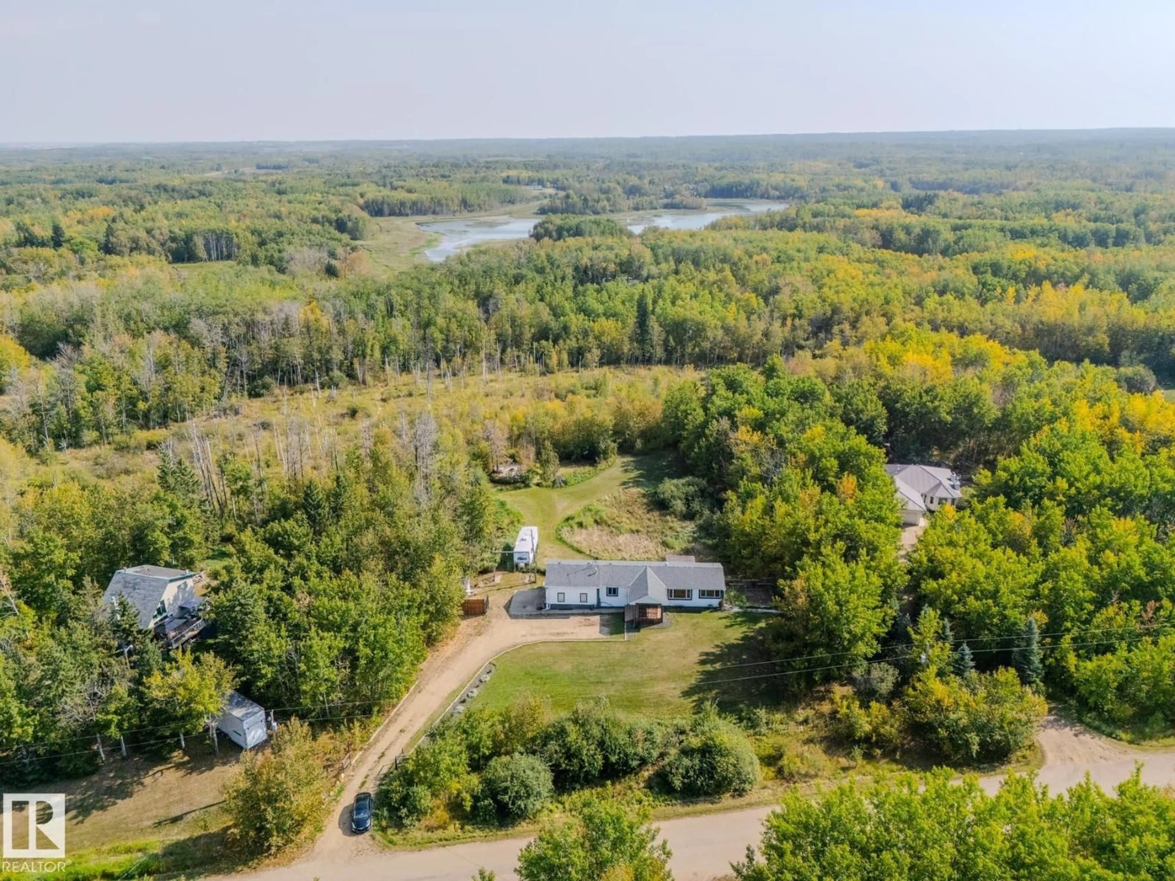 A pic from outside/outdoor area/front of a property/back of a property/a pic from drone, water/lake/river/ocean view for 79 50121 RR 204, Rural Beaver County Alberta T0B4J0