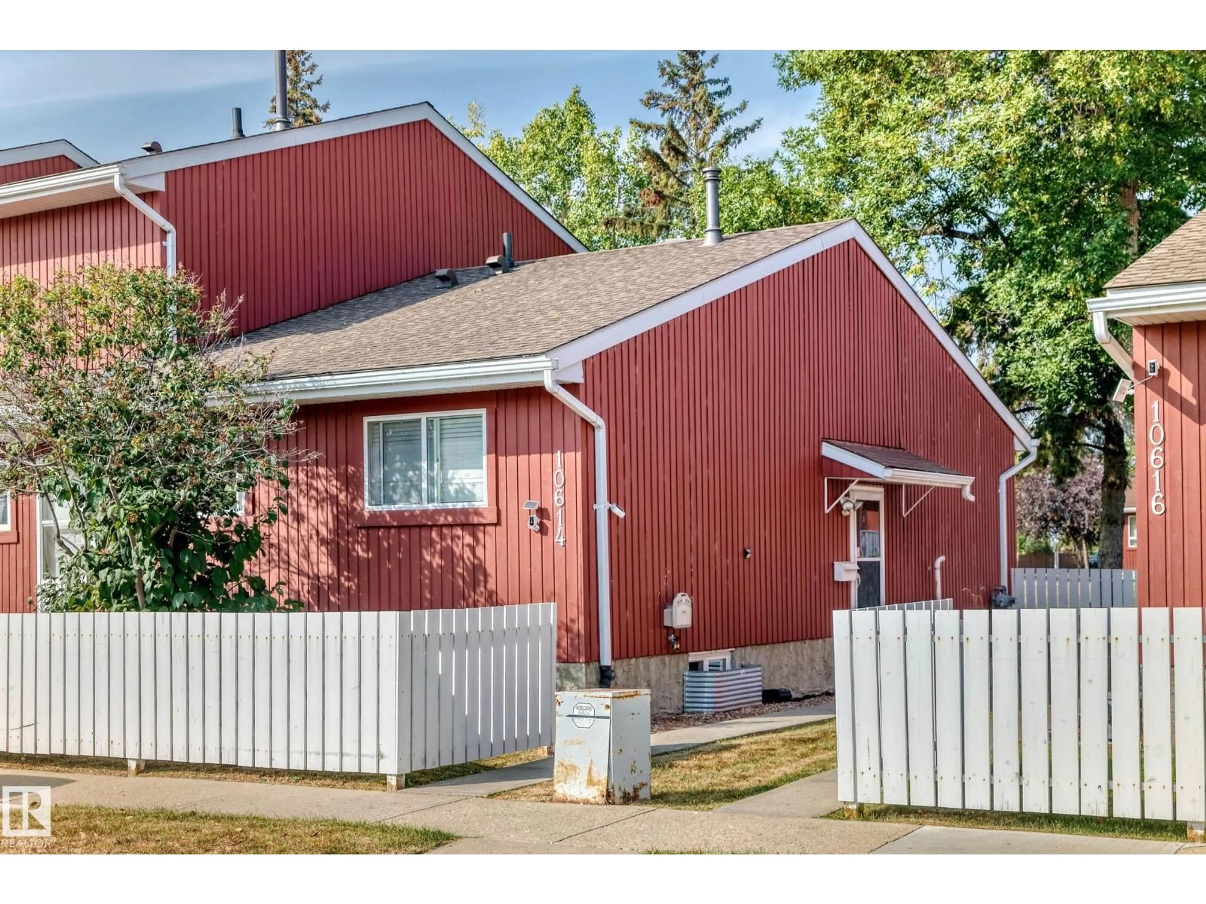 Home with vinyl exterior material, street for 10614 BEAUMARIS RD, Edmonton Alberta T5X3N4