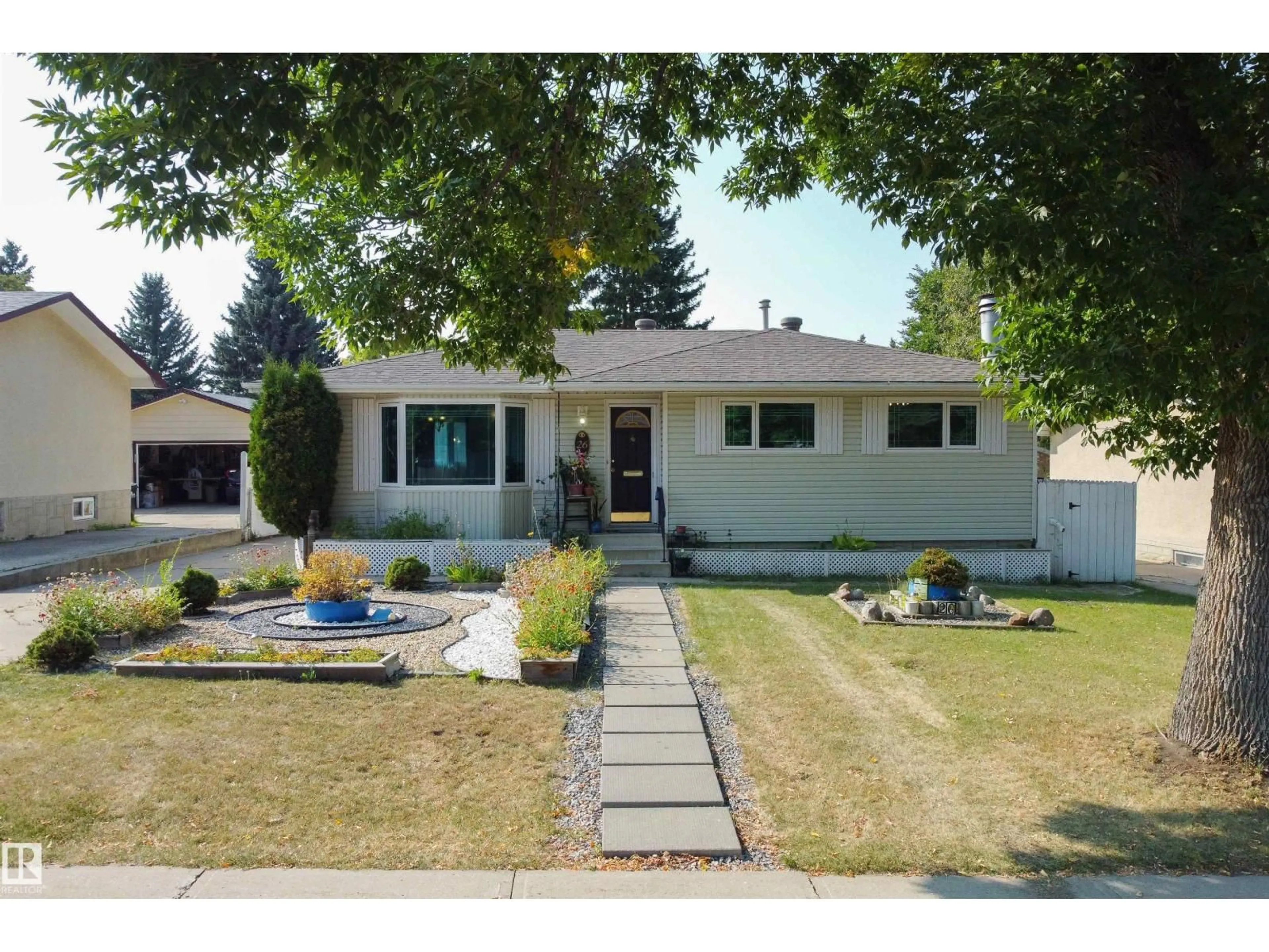 Home with vinyl exterior material, street for 26 PEACOCK DR, Sherwood Park Alberta T8A0A8