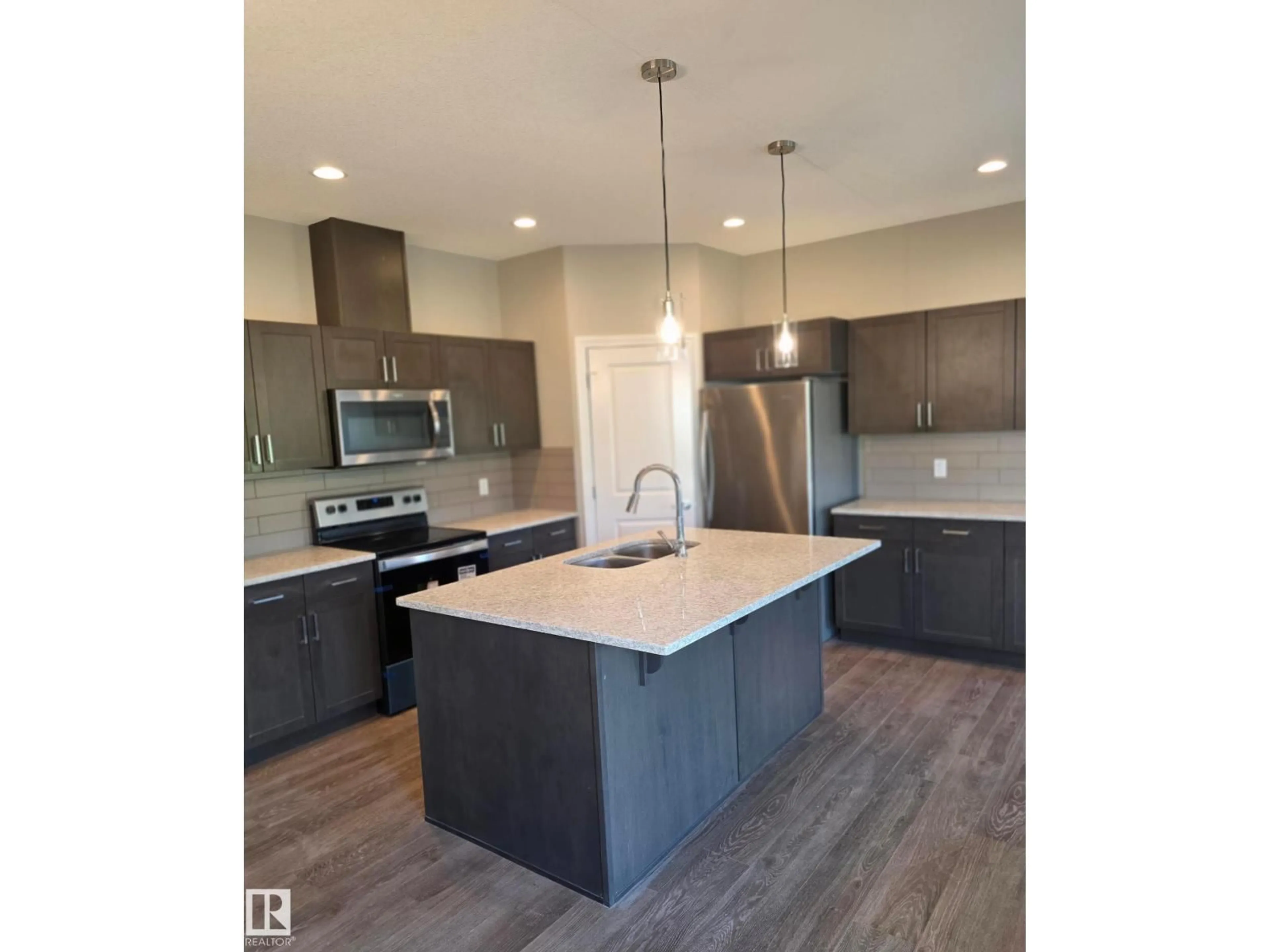Open concept kitchen, unknown for 4331 126 AV, Edmonton Alberta T5A1V5