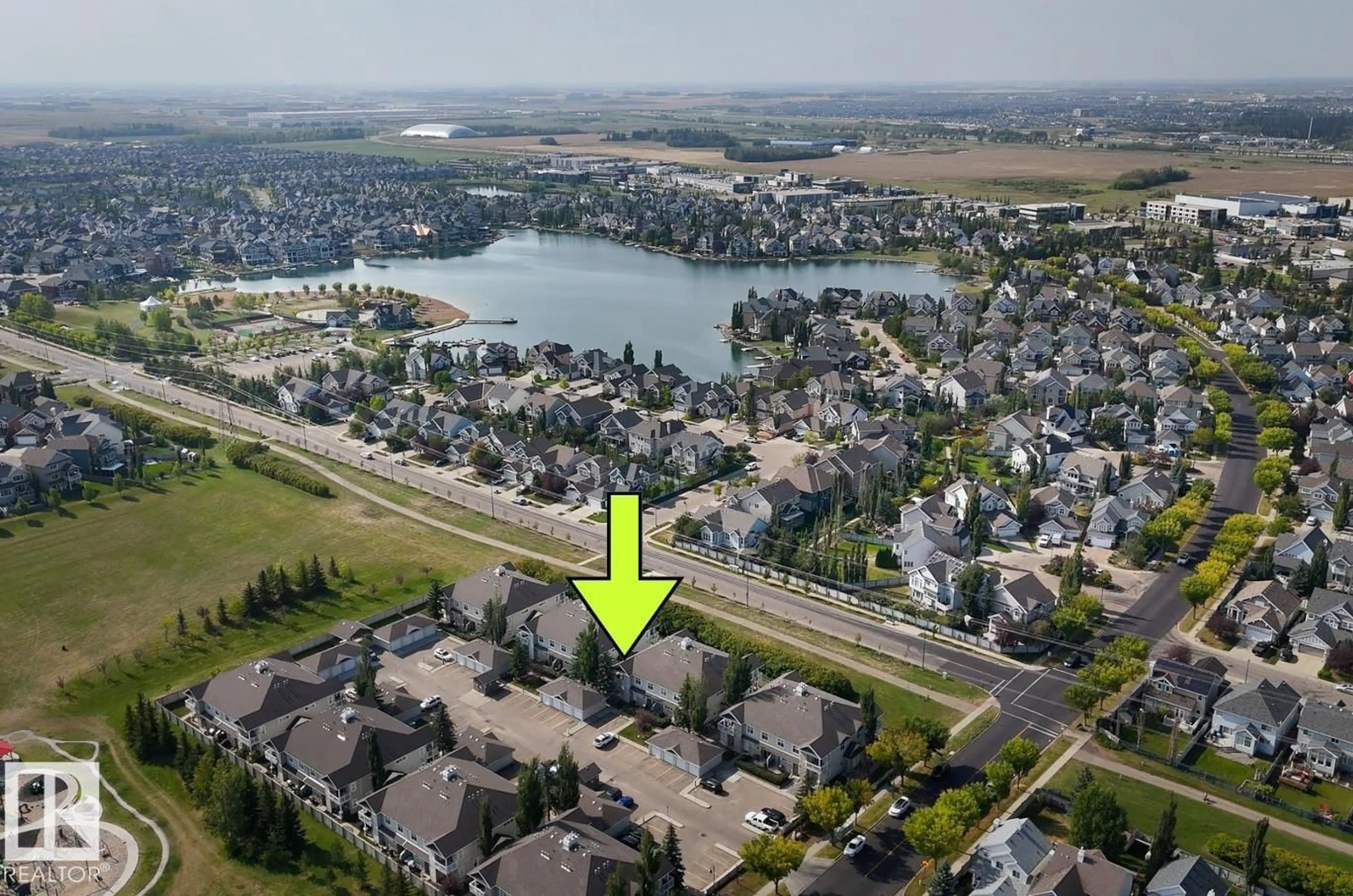 A pic from outside/outdoor area/front of a property/back of a property/a pic from drone, water/lake/river/ocean view for #51 - 1179 SUMMERSIDE DR, Edmonton Alberta T6X1K1