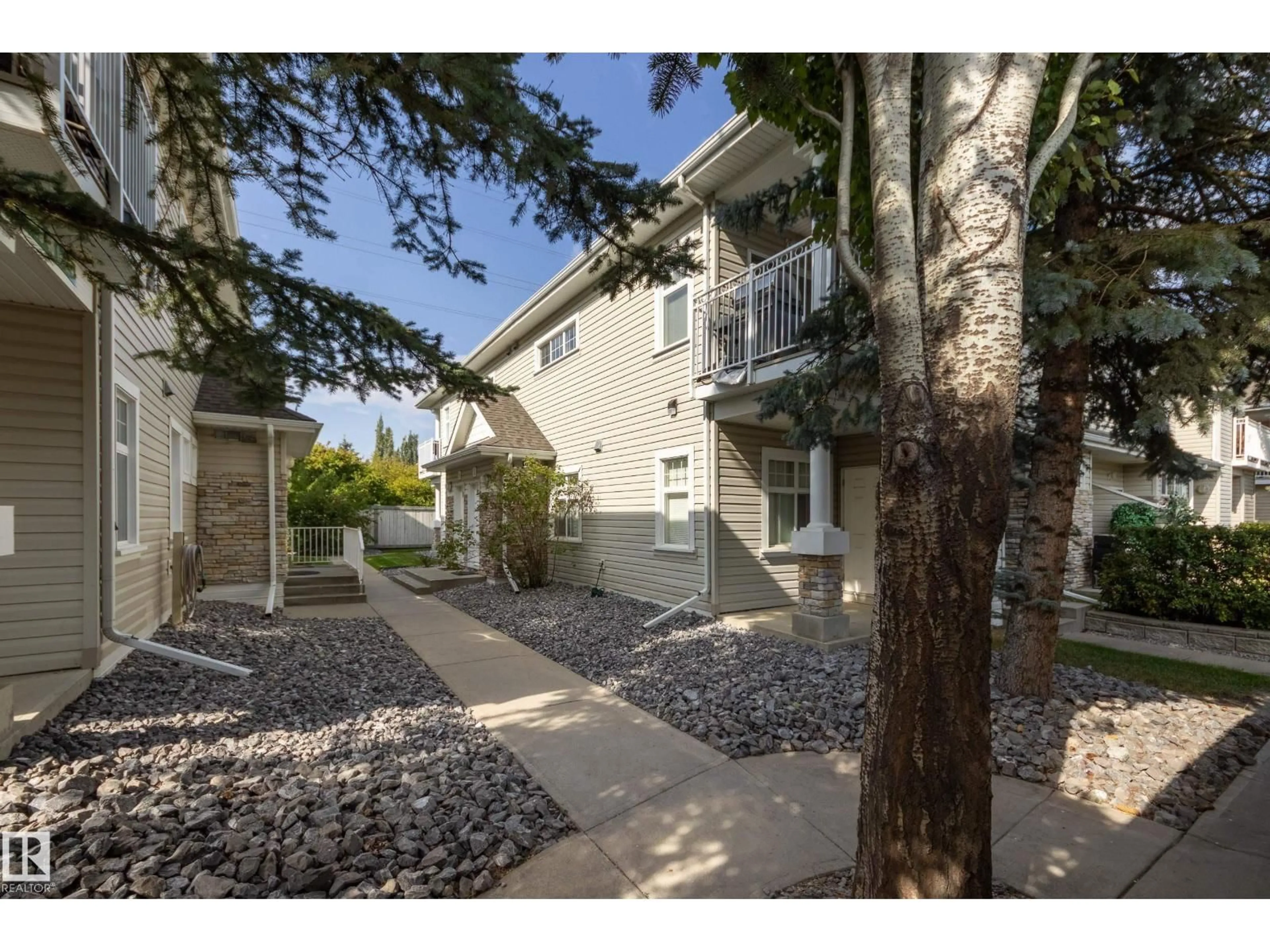 A pic from outside/outdoor area/front of a property/back of a property/a pic from drone, street for #51 - 1179 SUMMERSIDE DR, Edmonton Alberta T6X1K1