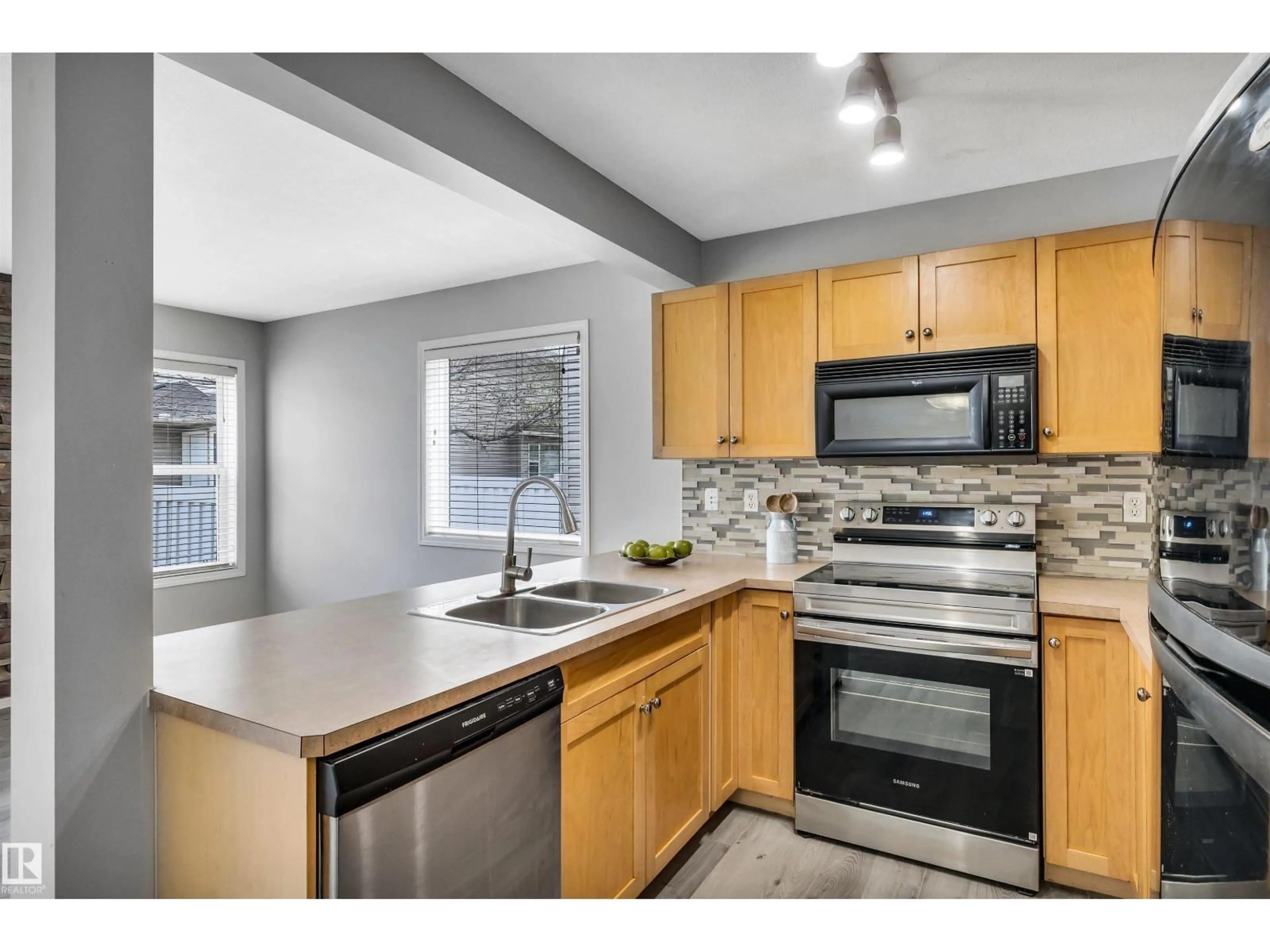 Standard kitchen, ceramic/tile floor for #100 - 230 EDWARDS DR, Edmonton Alberta T6X1G7