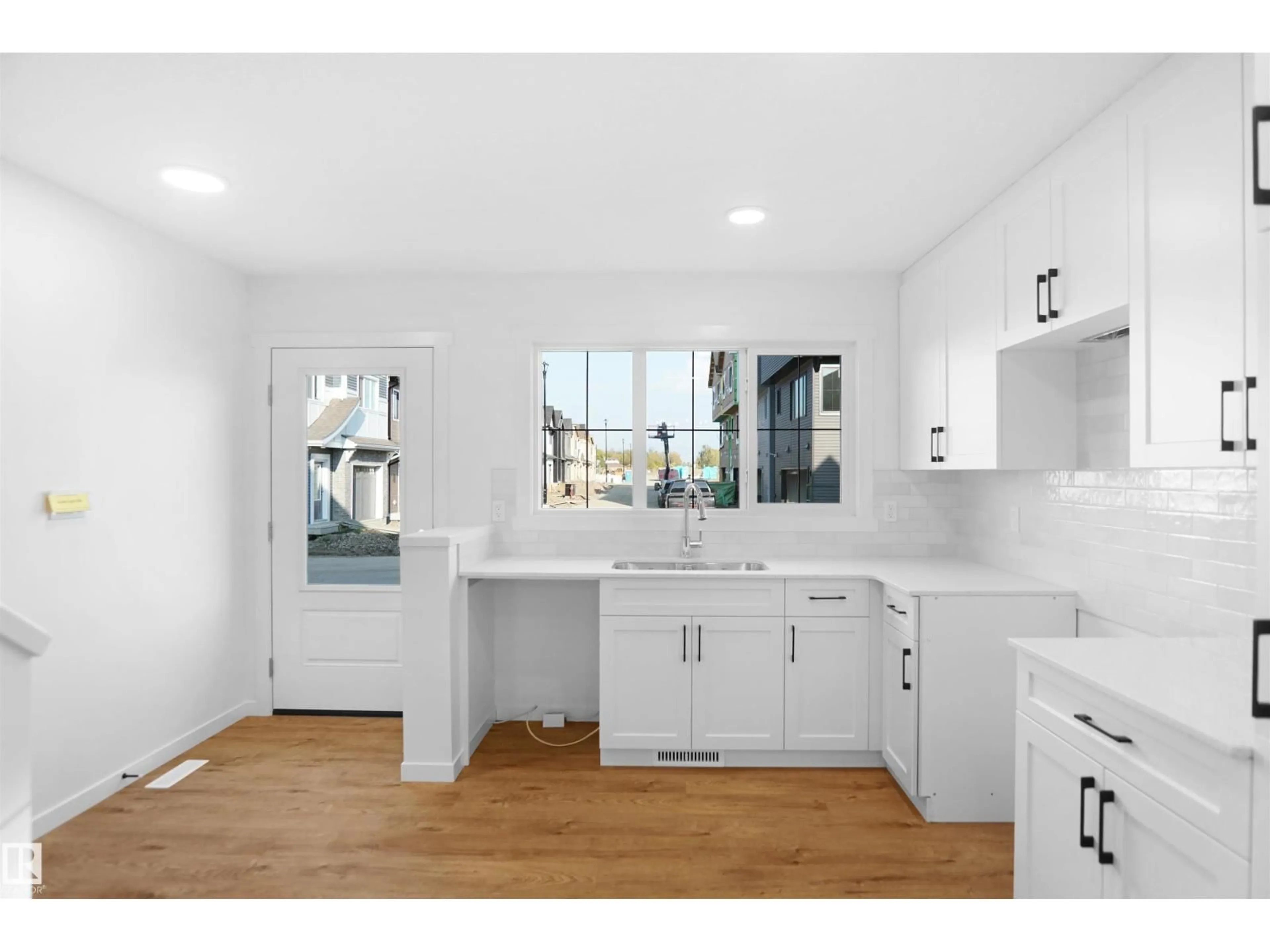 Open concept kitchen, ceramic/tile floor for #94 - 1430 ASTER WY, Edmonton Alberta T6T2N8
