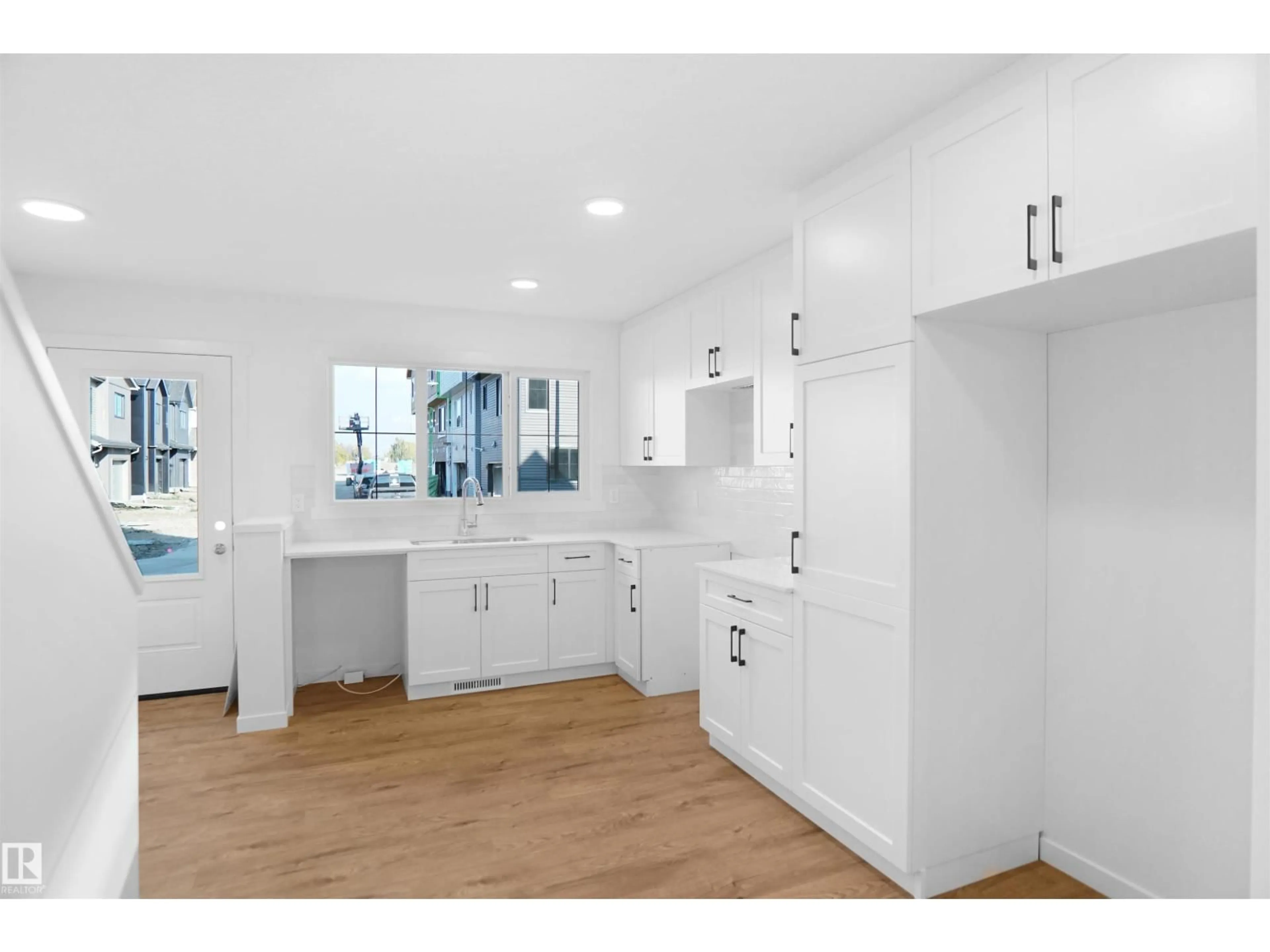 Open concept kitchen, unknown for #94 - 1430 ASTER WY, Edmonton Alberta T6T2N8