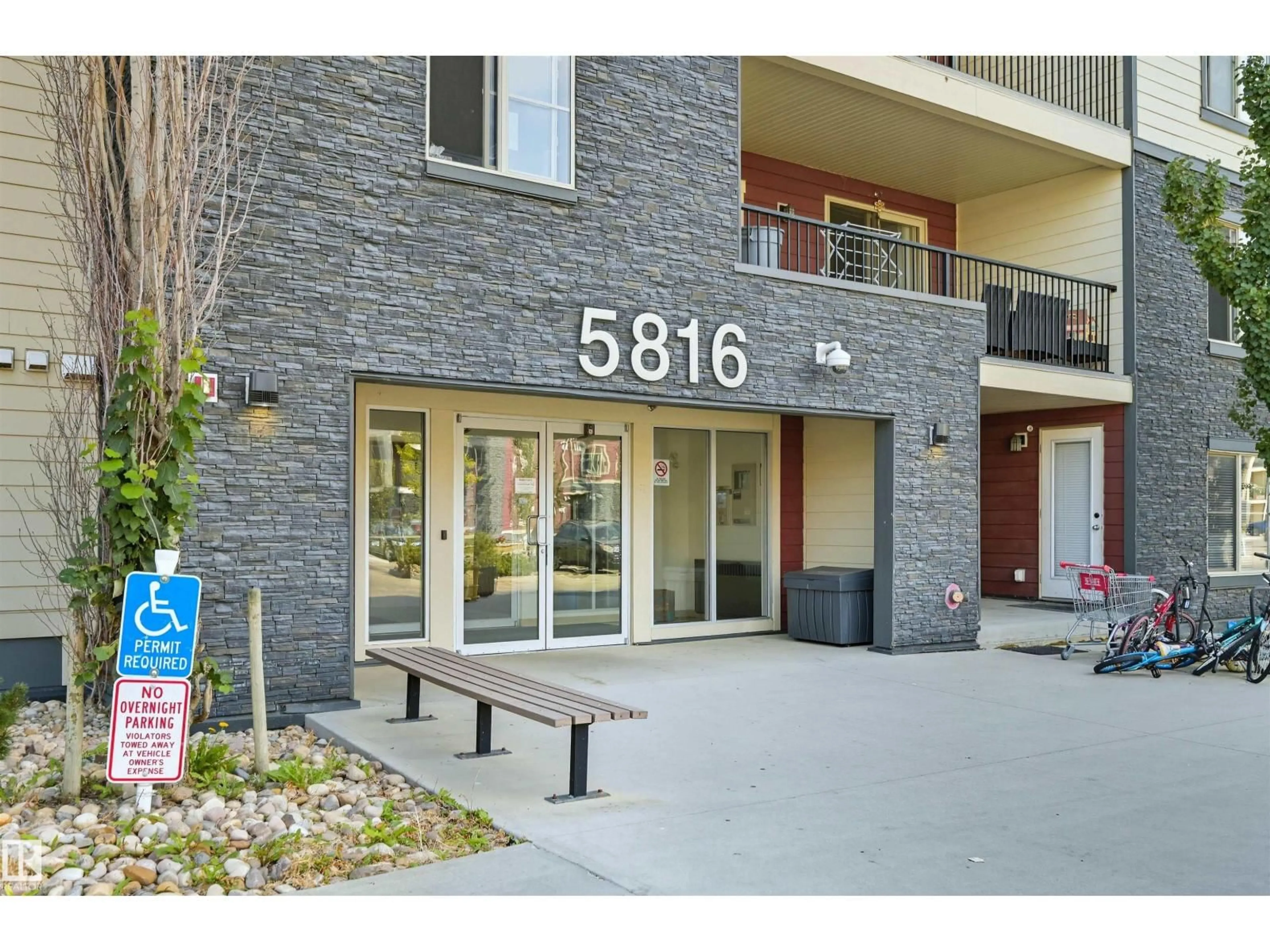 Indoor foyer for 321 - 5816 MULLEN PL, Edmonton Alberta T5Y3X7