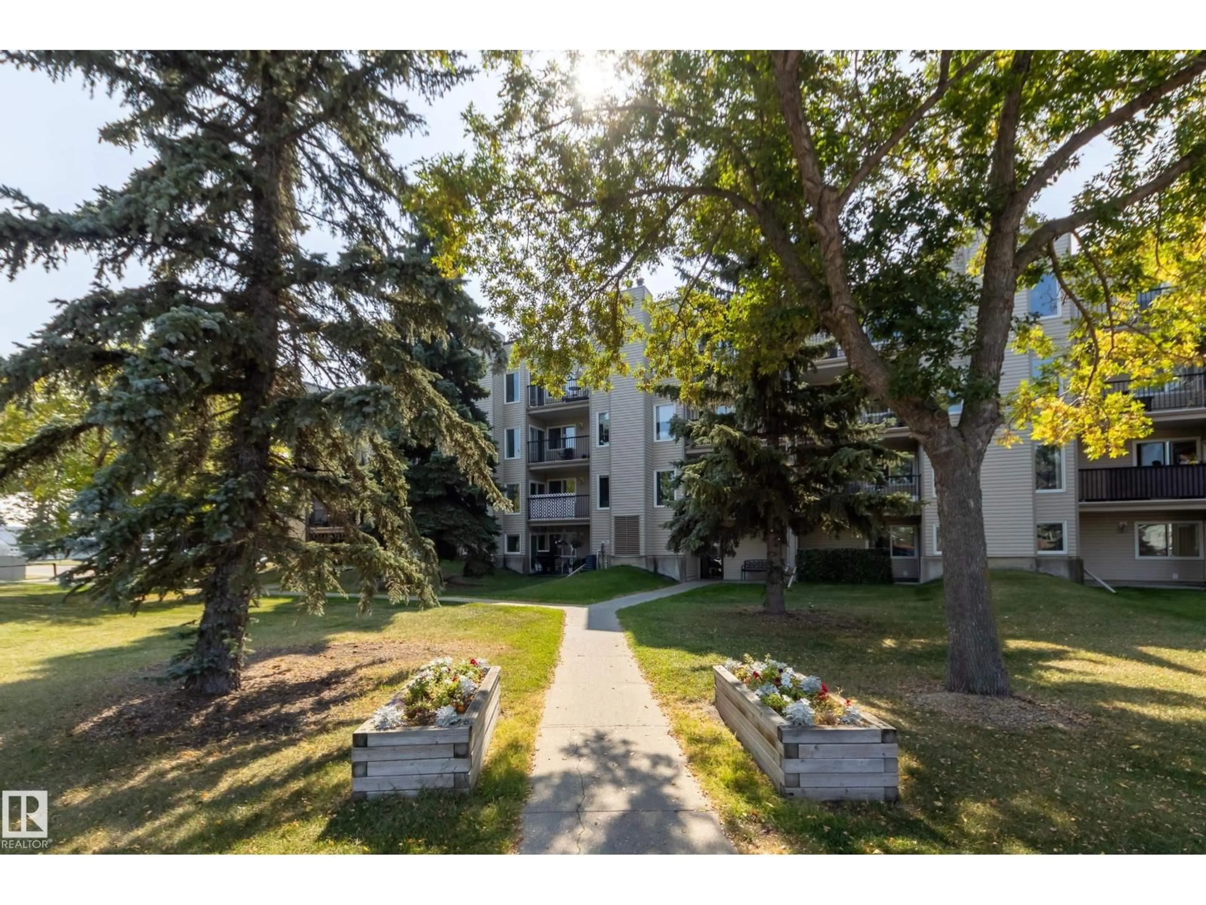 Patio, street for #101 - 17820 98 AV, Edmonton Alberta T5T3H5