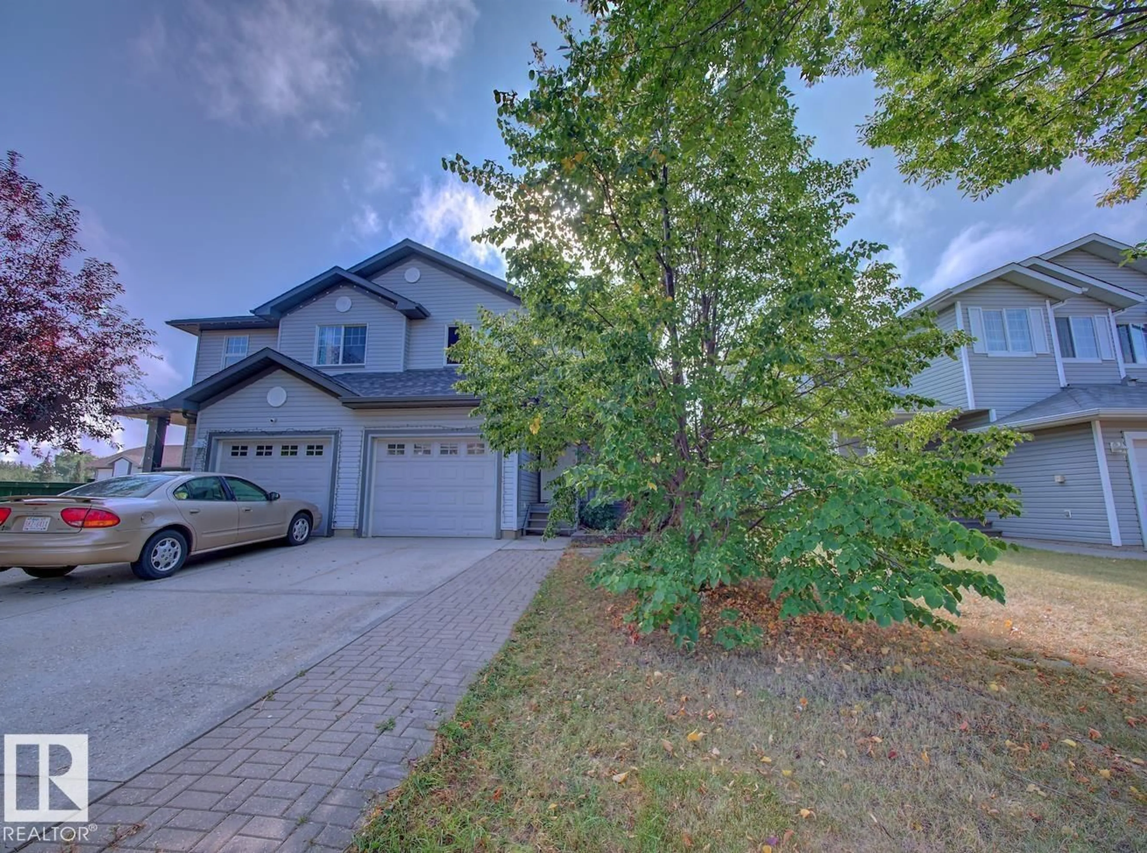 A pic from outside/outdoor area/front of a property/back of a property/a pic from drone, street for 147 WESTWOOD LN, Fort Saskatchewan Alberta T0B4N8
