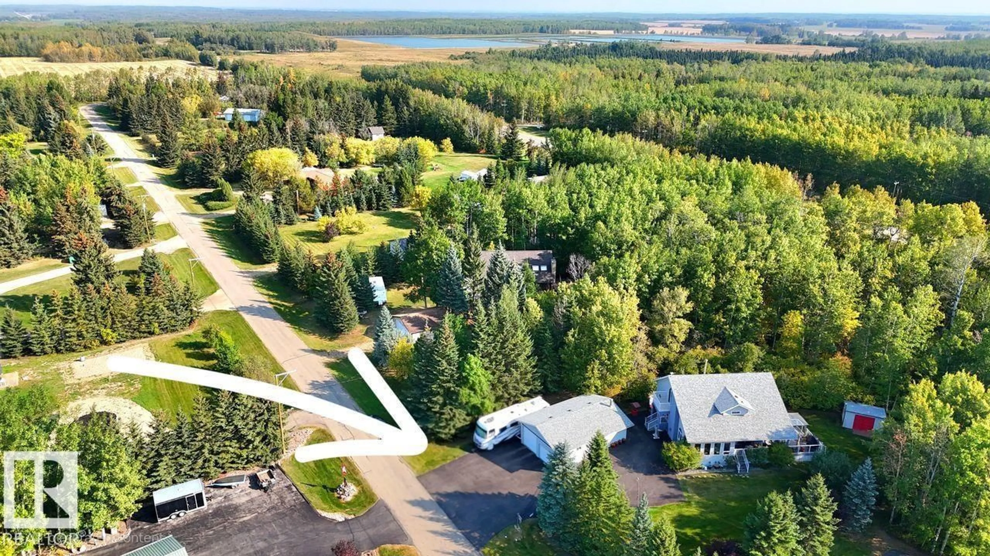 A pic from outside/outdoor area/front of a property/back of a property/a pic from drone, unknown for 5402 32 ST, Rural Wetaskiwin County Alberta T0C2C0