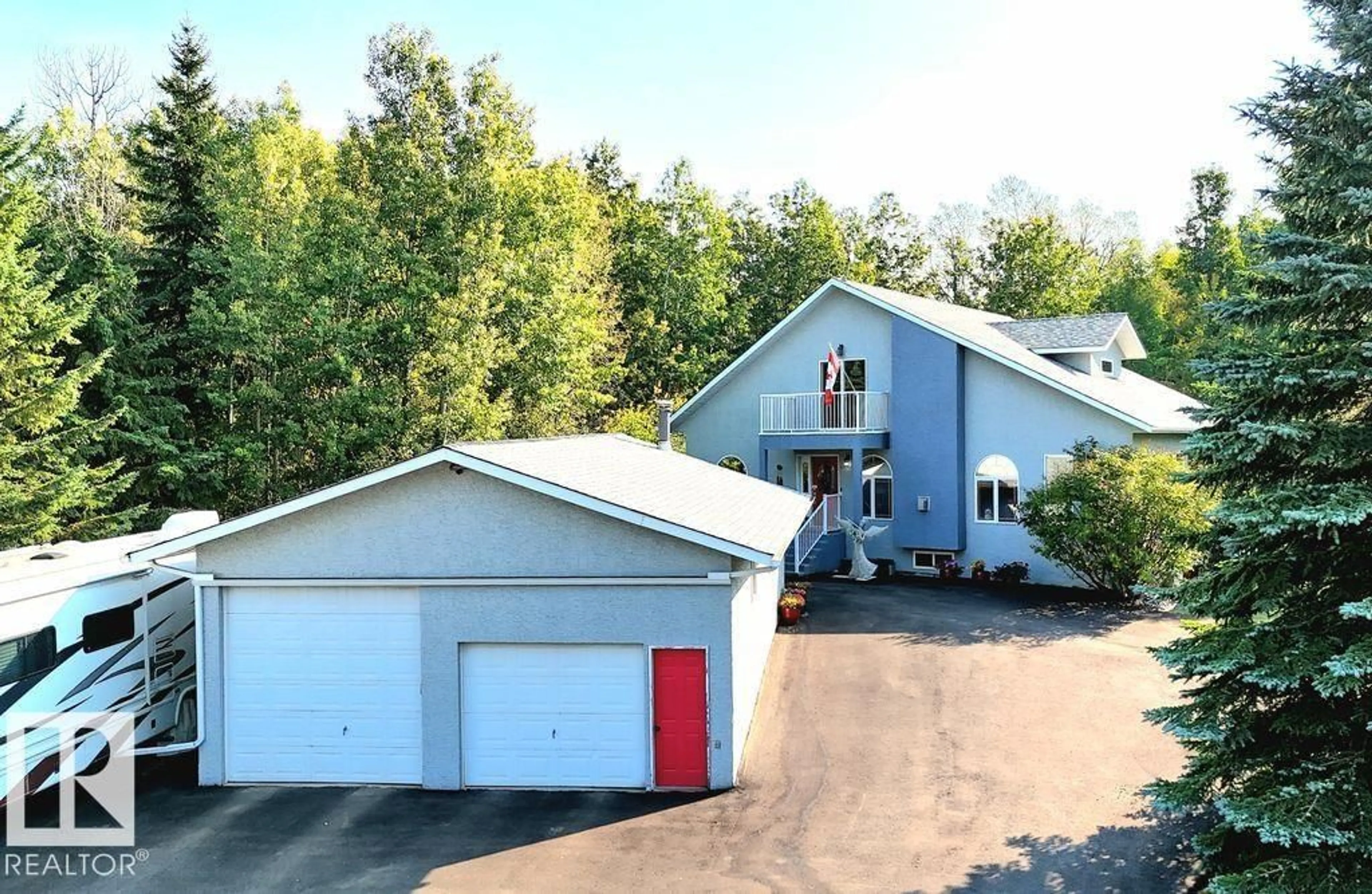 A pic from outside/outdoor area/front of a property/back of a property/a pic from drone, unknown for 5402 32 ST, Rural Wetaskiwin County Alberta T0C2C0