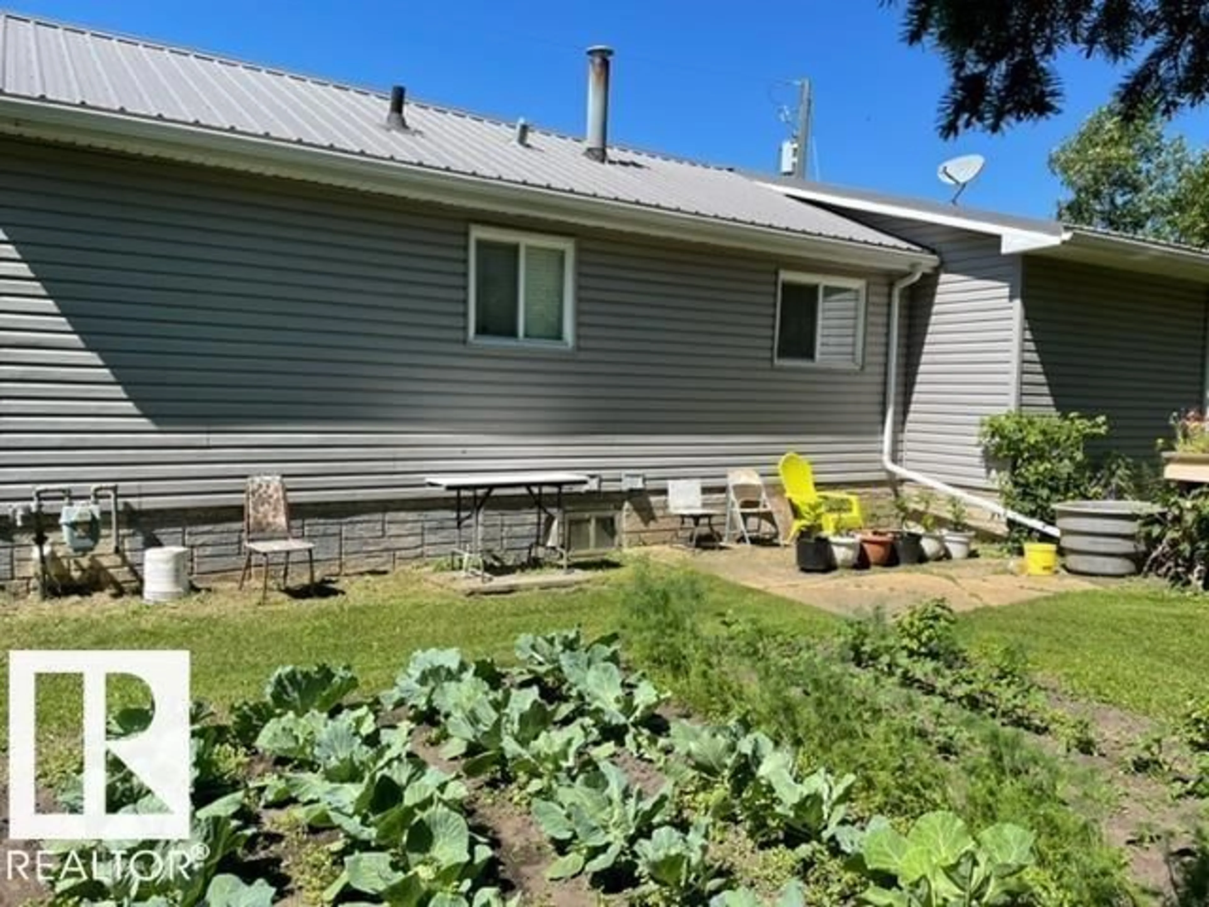 A pic from outside/outdoor area/front of a property/back of a property/a pic from drone, street for 5417 51 AV, Lamont Alberta T0B2R0