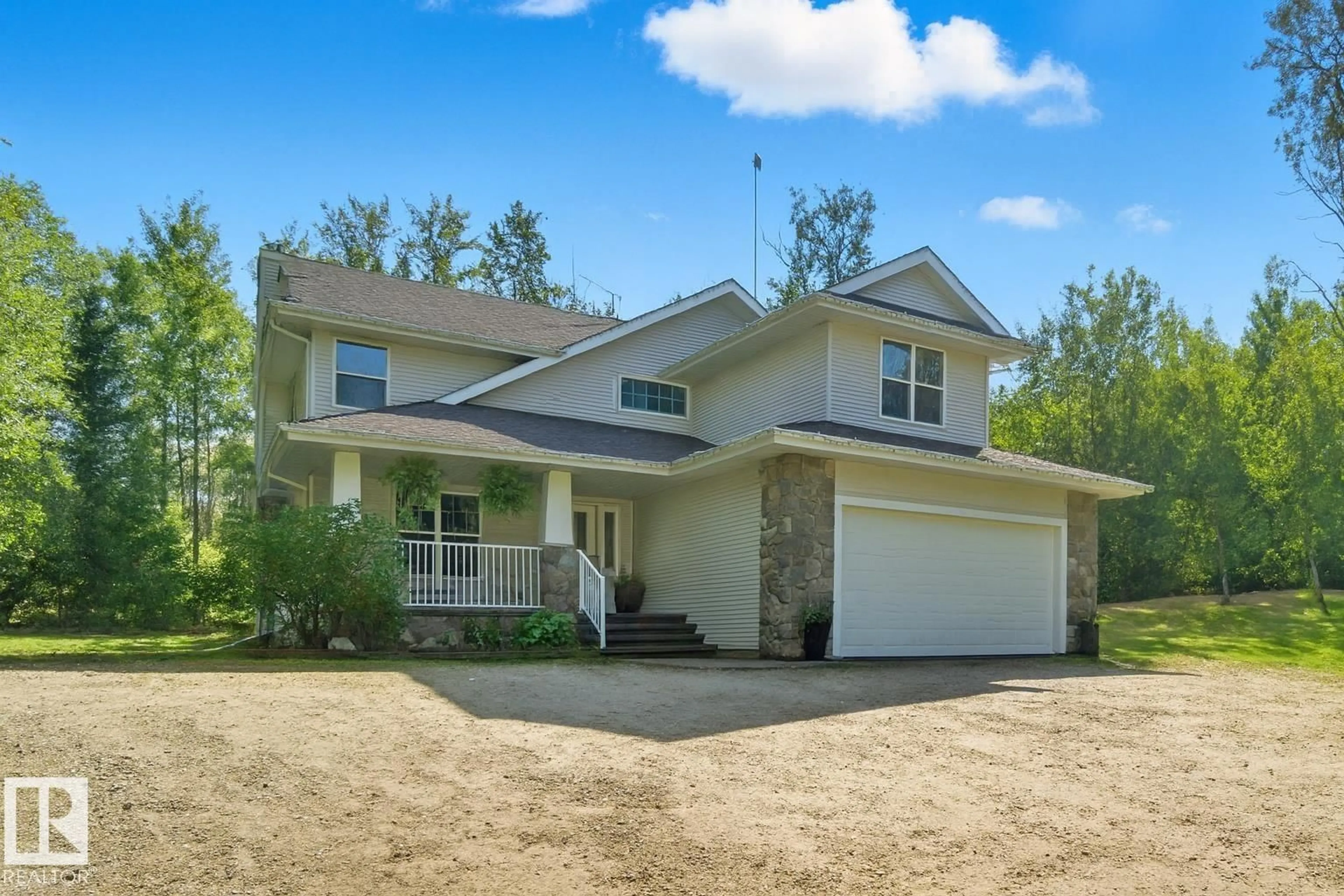 Home with vinyl exterior material, street for 52228 - 70 RGE ROAD 30, Rural Parkland County Alberta T7Y2M5