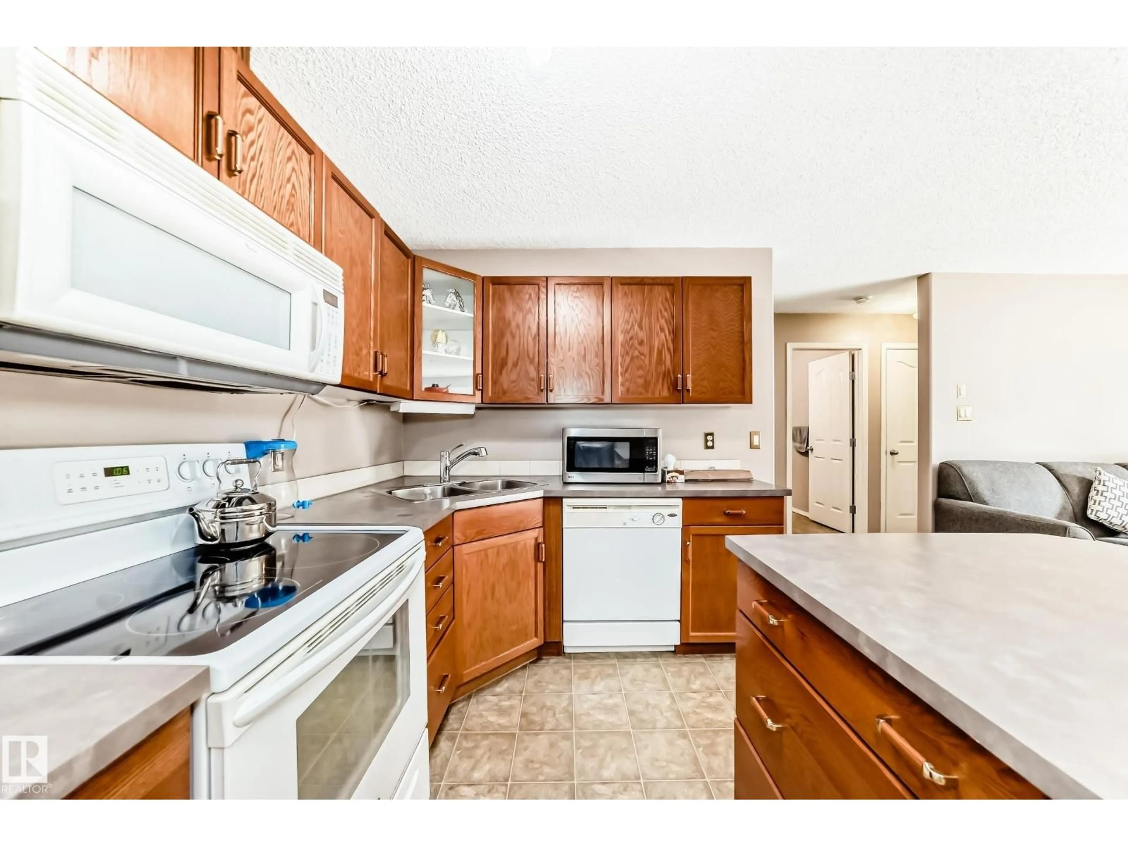 Standard kitchen, ceramic/tile floor for NW - 138 16311 95 ST, Edmonton Alberta T6Z3Y5