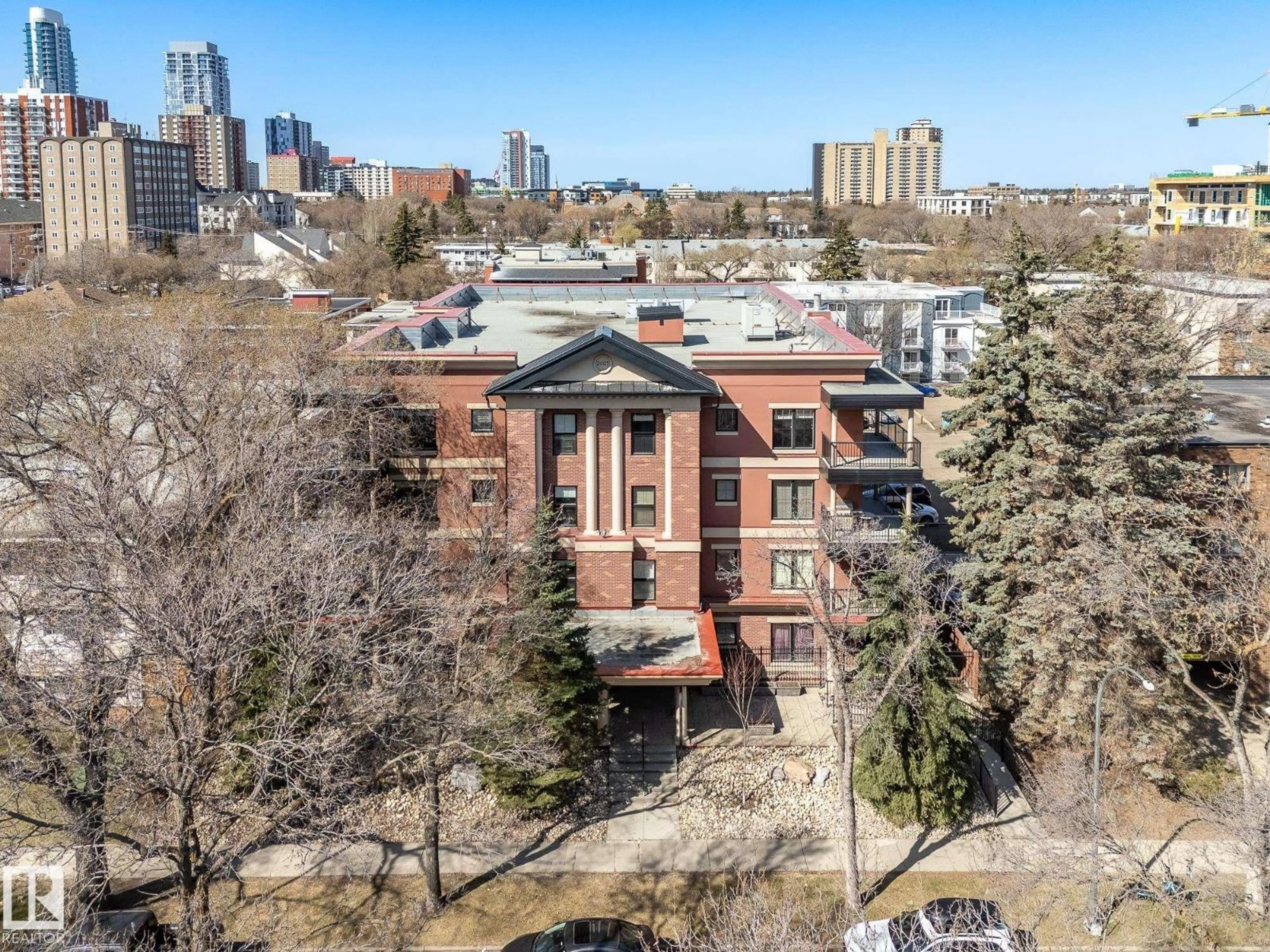 A pic from outside/outdoor area/front of a property/back of a property/a pic from drone, city buildings view from balcony for #104 - 10232 115 ST, Edmonton Alberta T5K1T8
