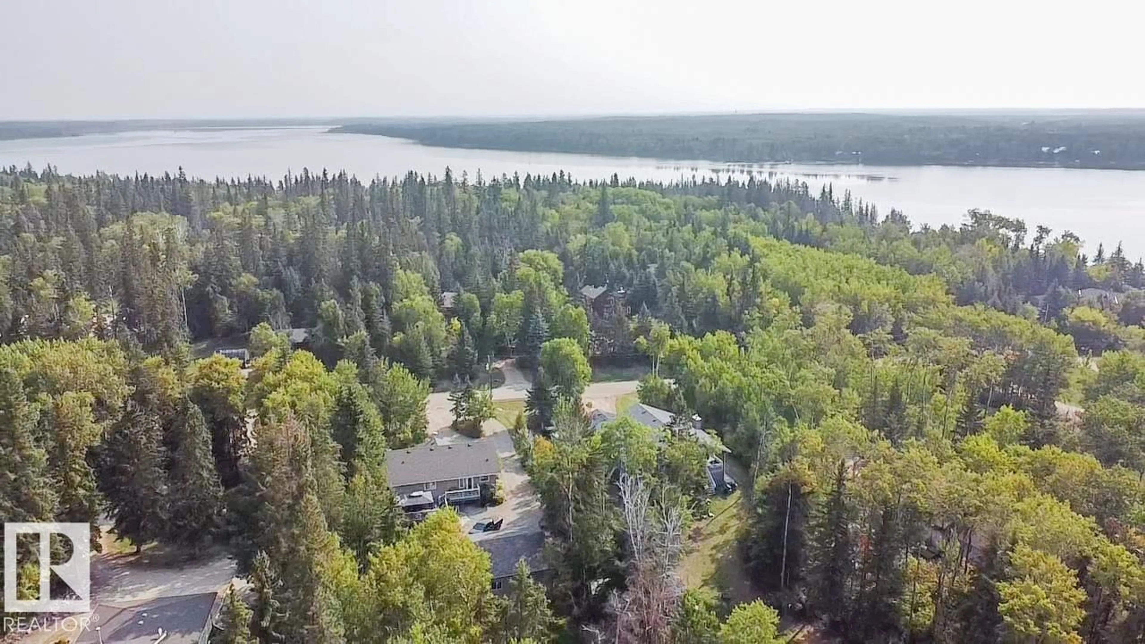 A pic from outside/outdoor area/front of a property/back of a property/a pic from drone, water/lake/river/ocean view for 61223 - 15 RGE RD 470, Rural Bonnyville M.D. Alberta T9N2J6