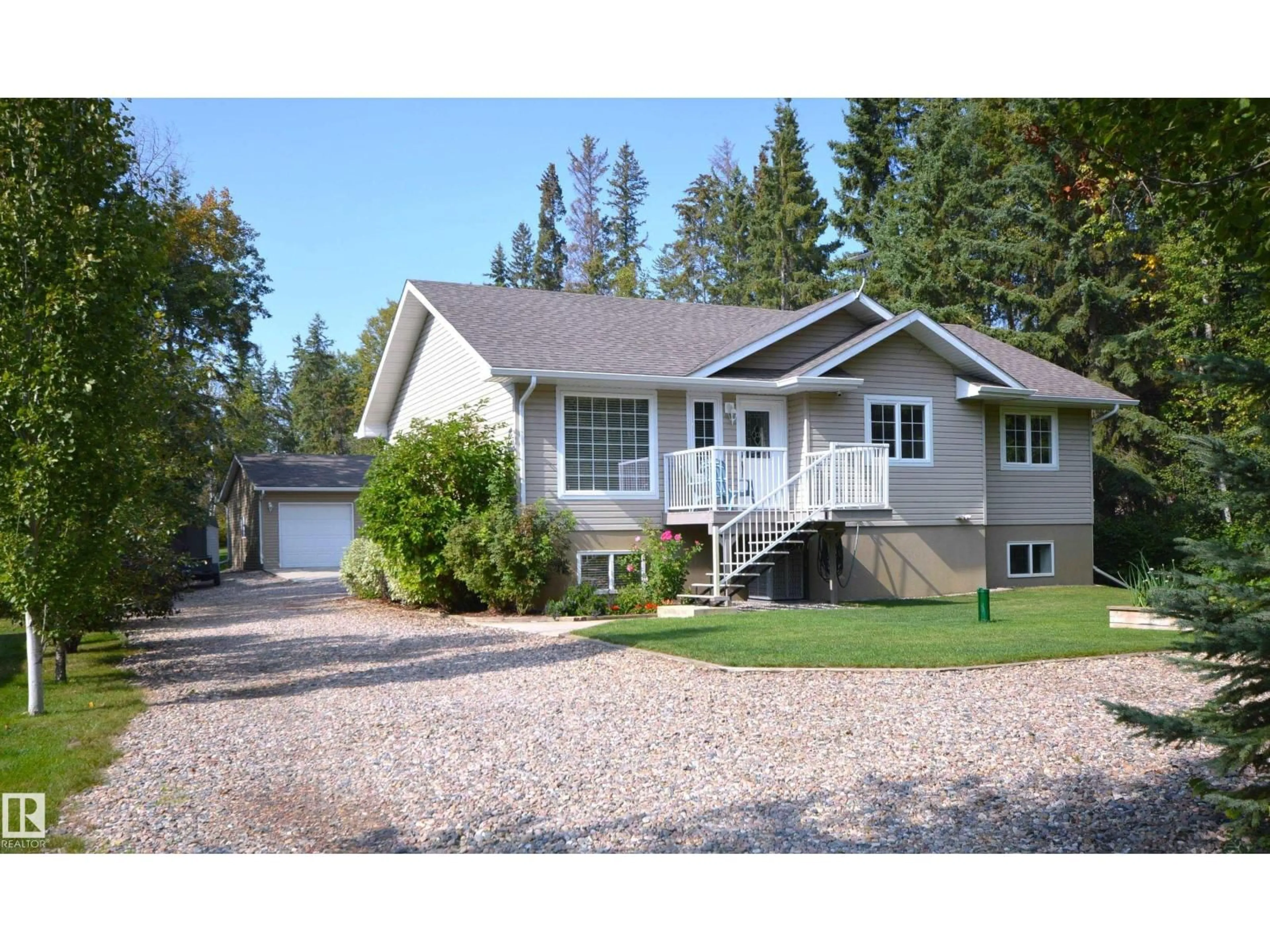 Home with vinyl exterior material, street for 61223 - 15 RGE RD 470, Rural Bonnyville M.D. Alberta T9N2J6