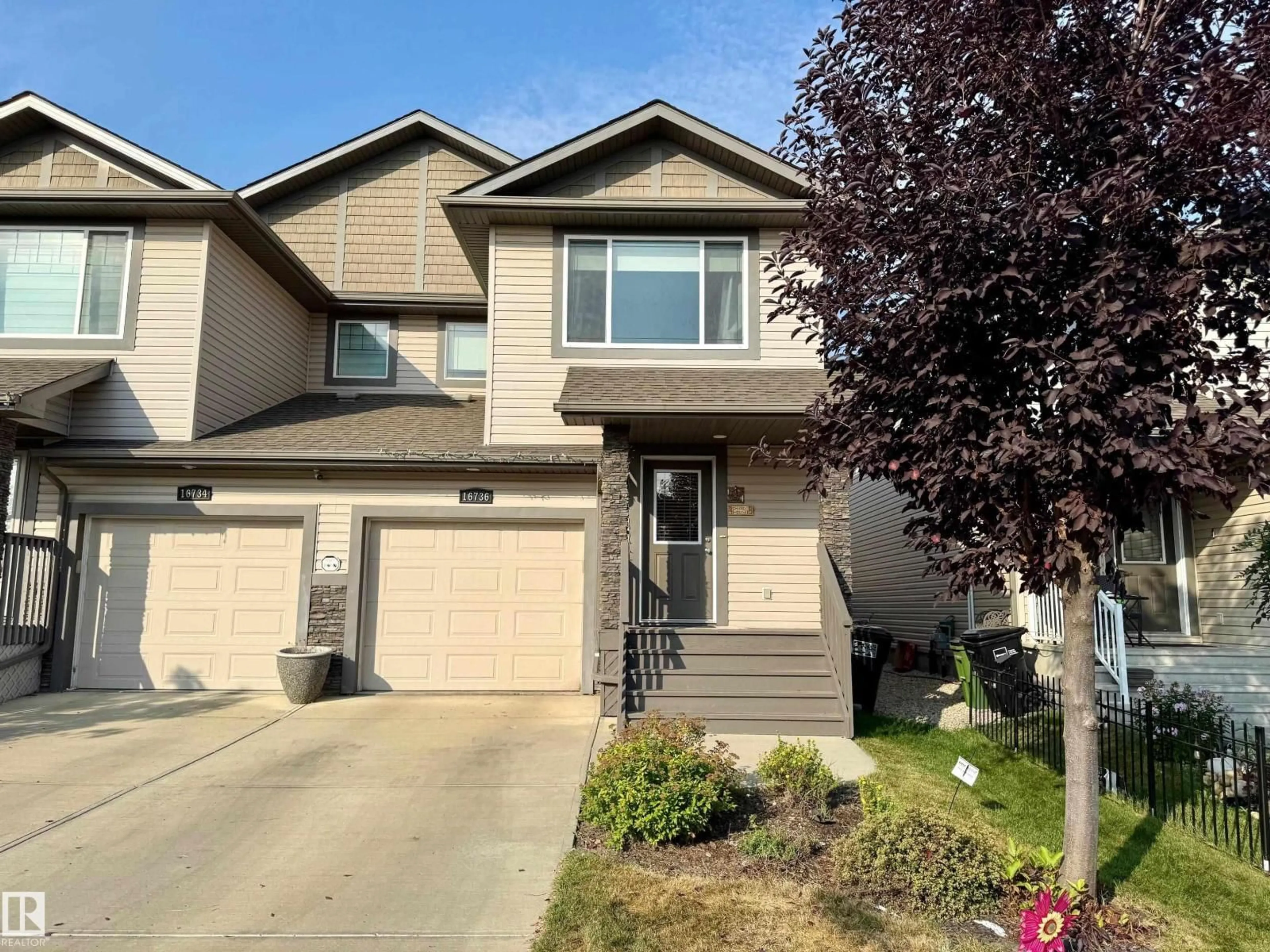 Home with vinyl exterior material, street for NW - 16736 53 ST, Edmonton Alberta T5Y0R6