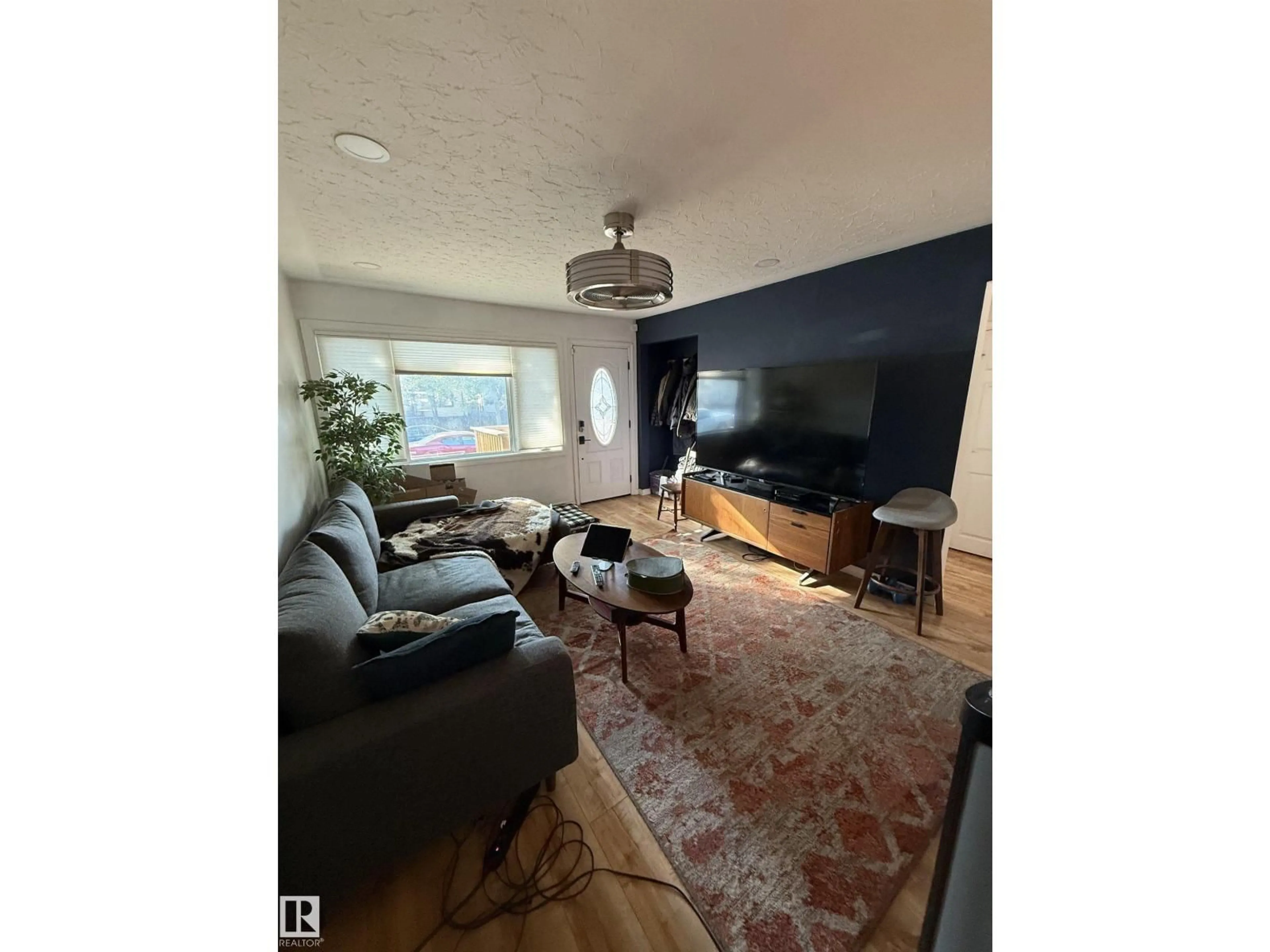 Living room with furniture, unknown for 12131 65 ST, Edmonton Alberta T5W4L6