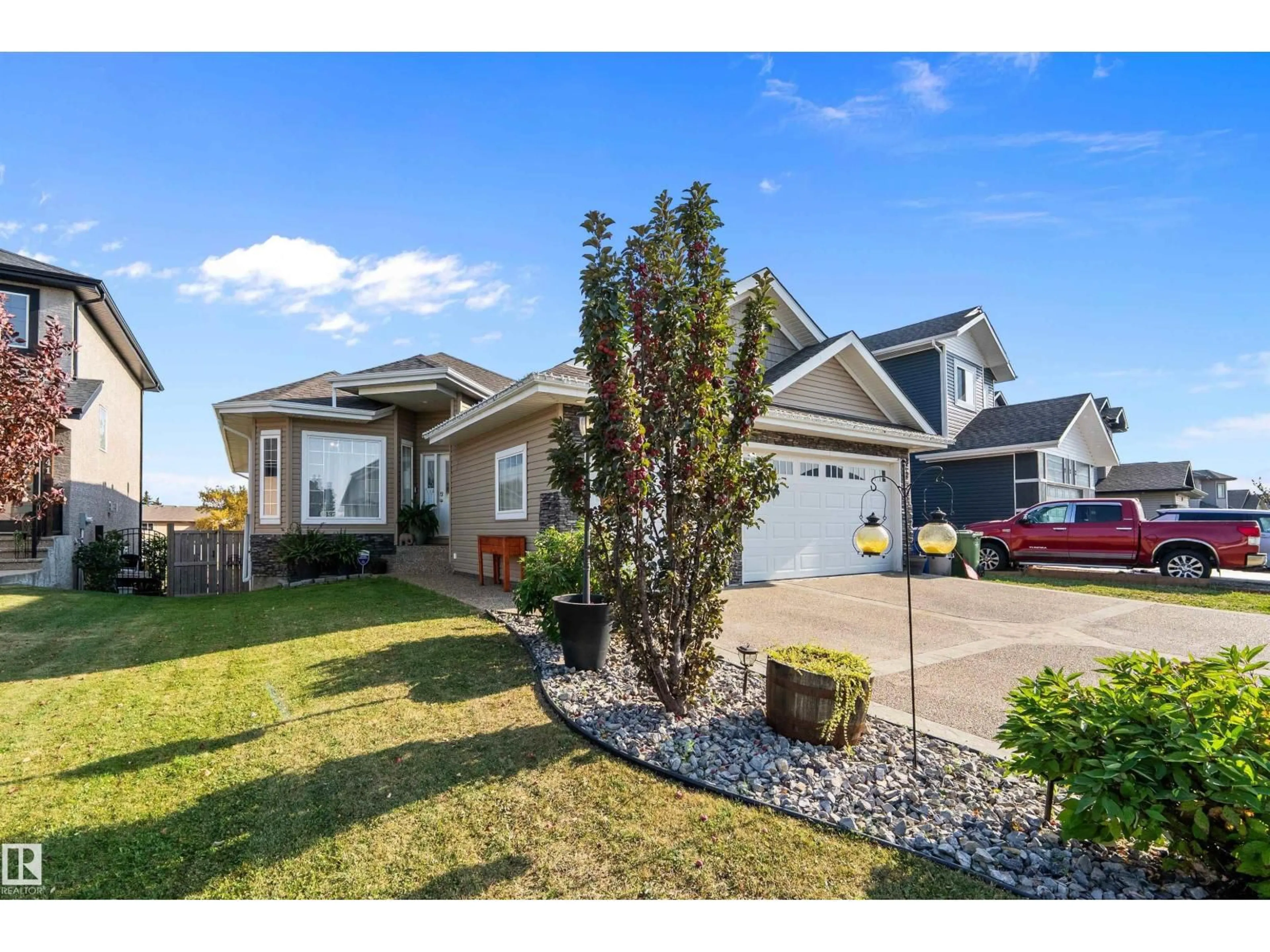 Home with vinyl exterior material, street for 137 CYPRESS DR, Wetaskiwin Alberta T9A1K6